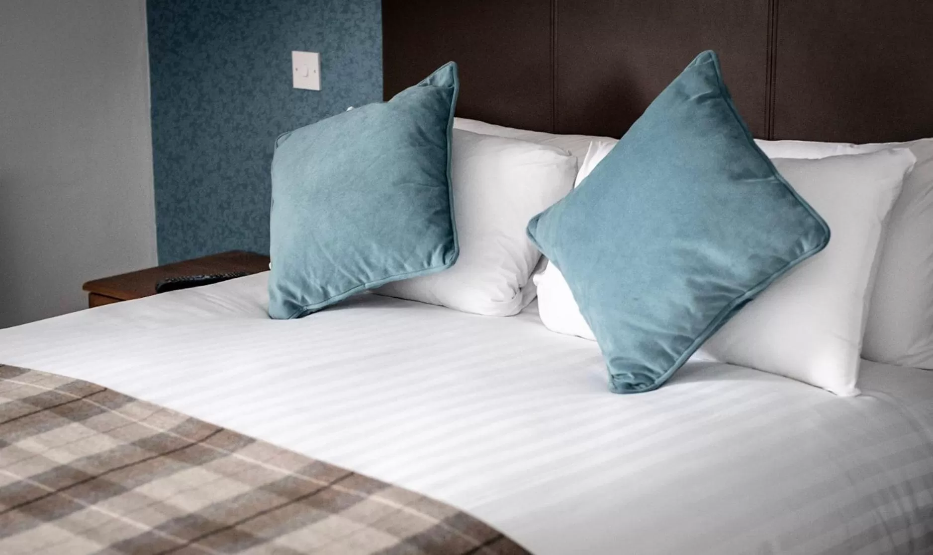 Bed in King Robert Hotel