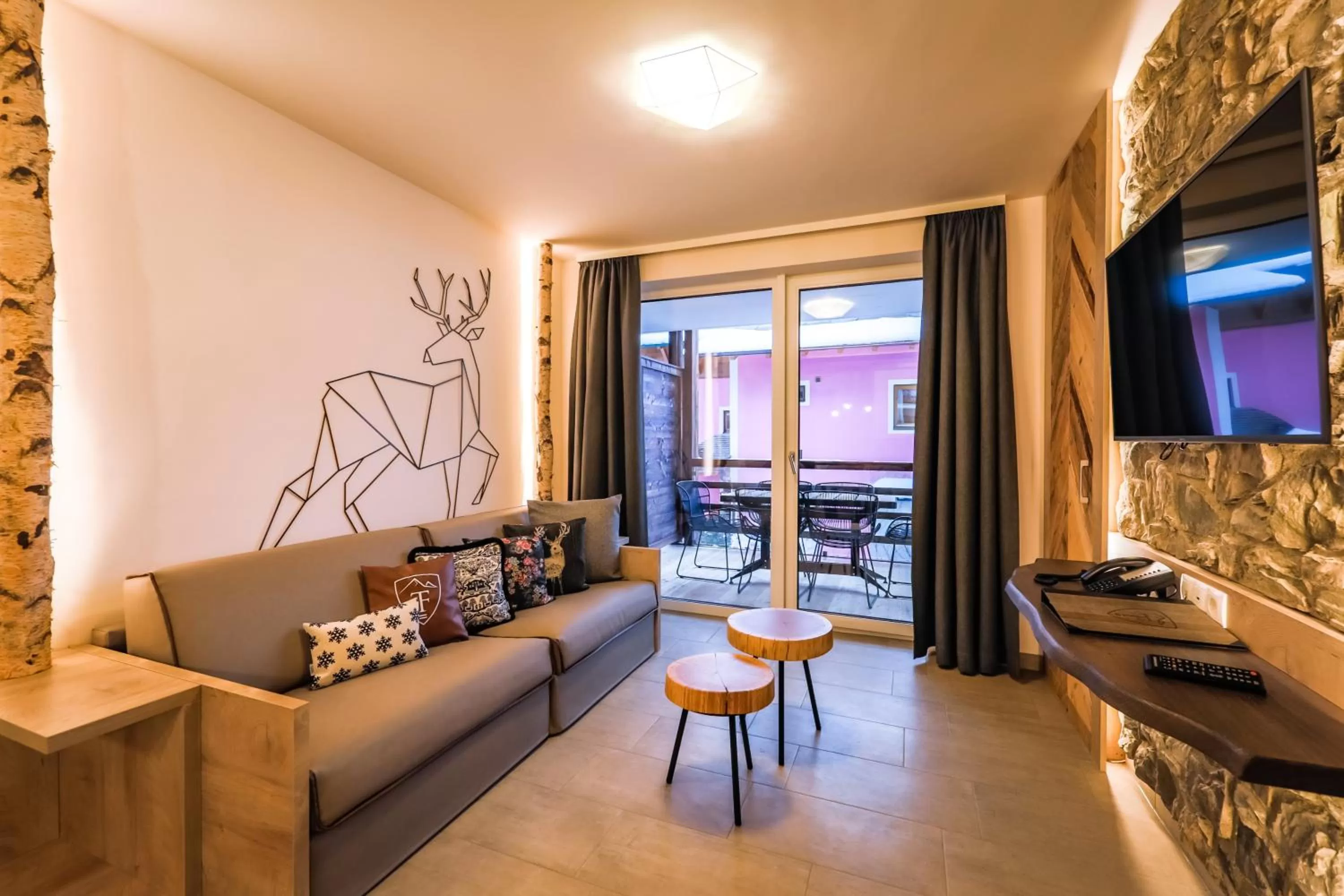 Living room in 24 by AvenidA - Mountain Hotel