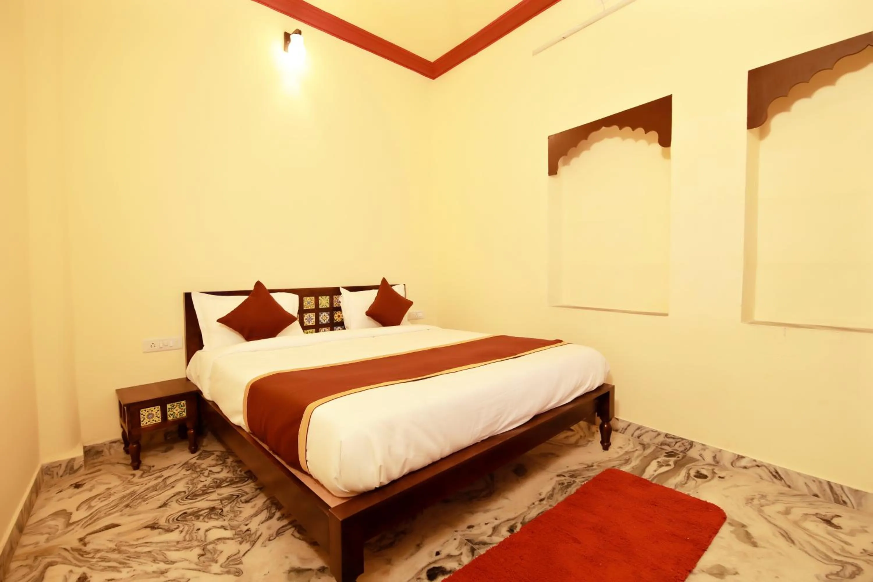 Bed in The Kanchangarh Resort