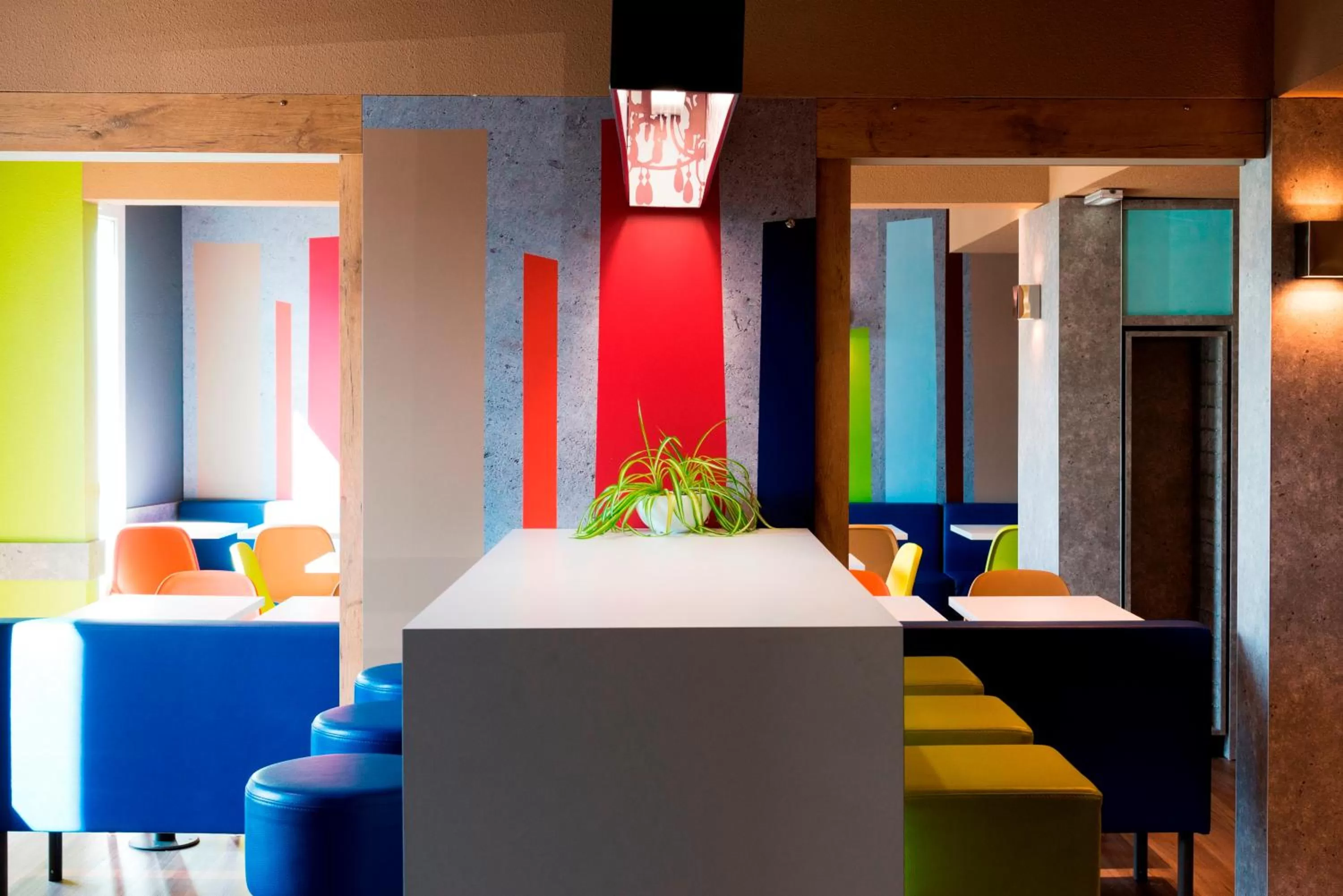 Communal lounge/ TV room in ibis budget Granville