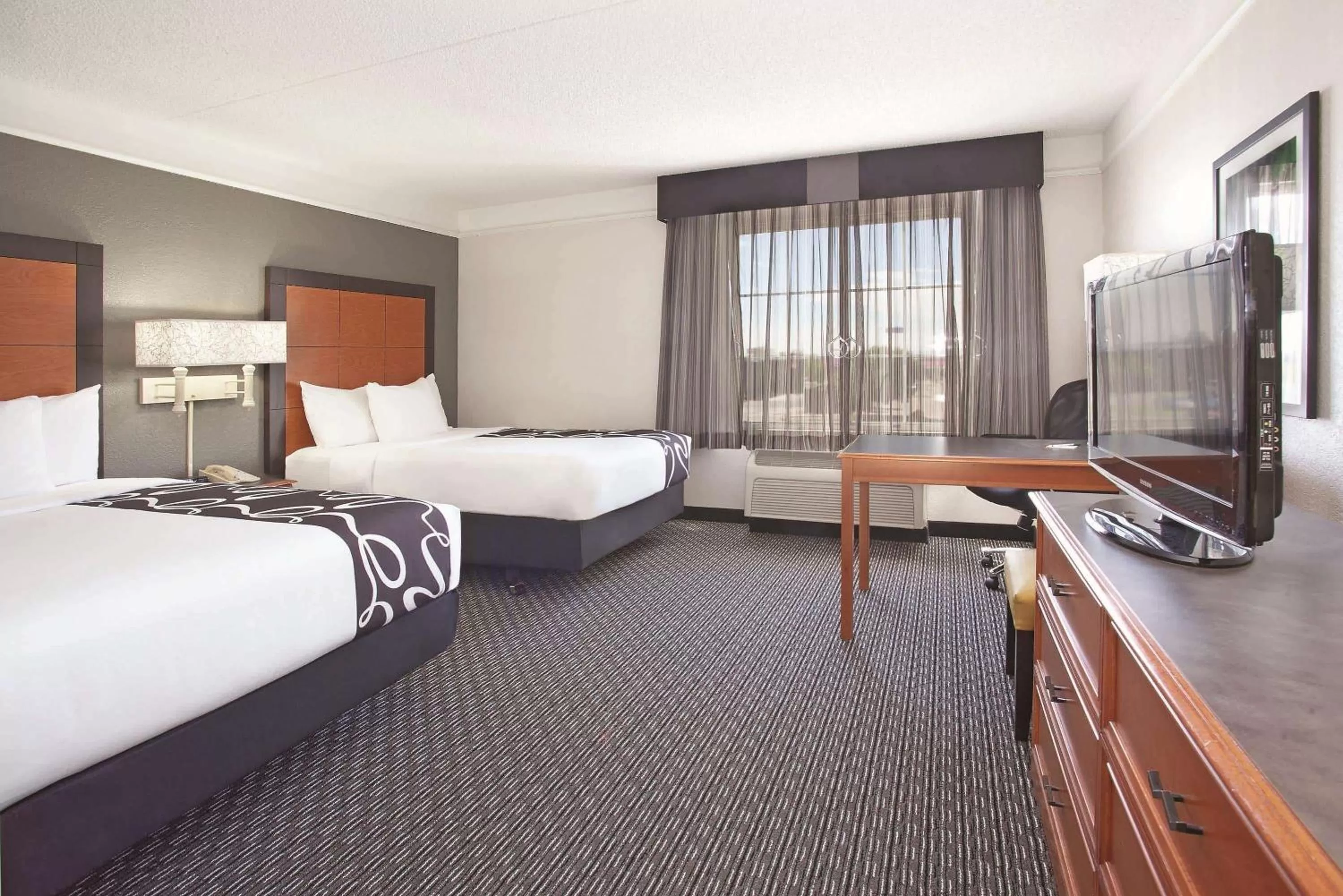 Photo of the whole room, Bed in La Quinta by Wyndham Pueblo