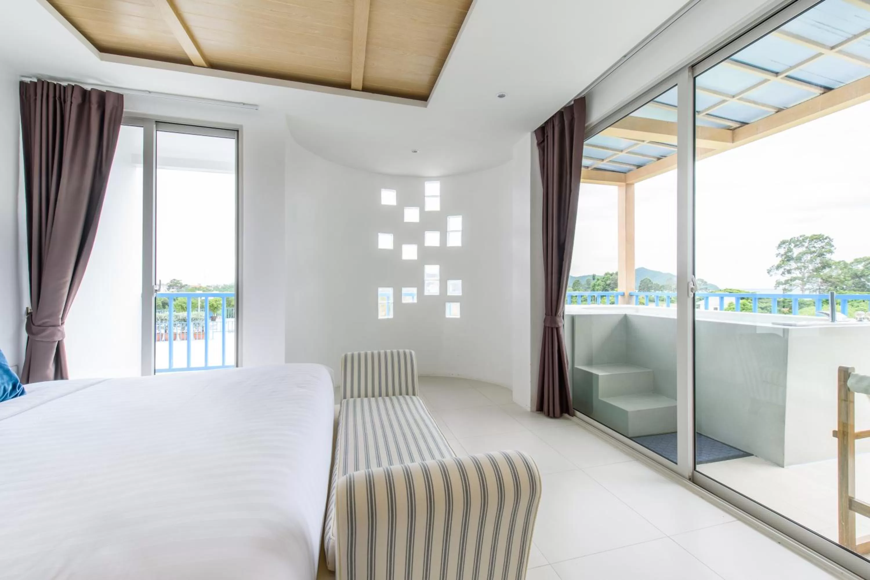 Seating area, Bed in Costa Village Bangsaray