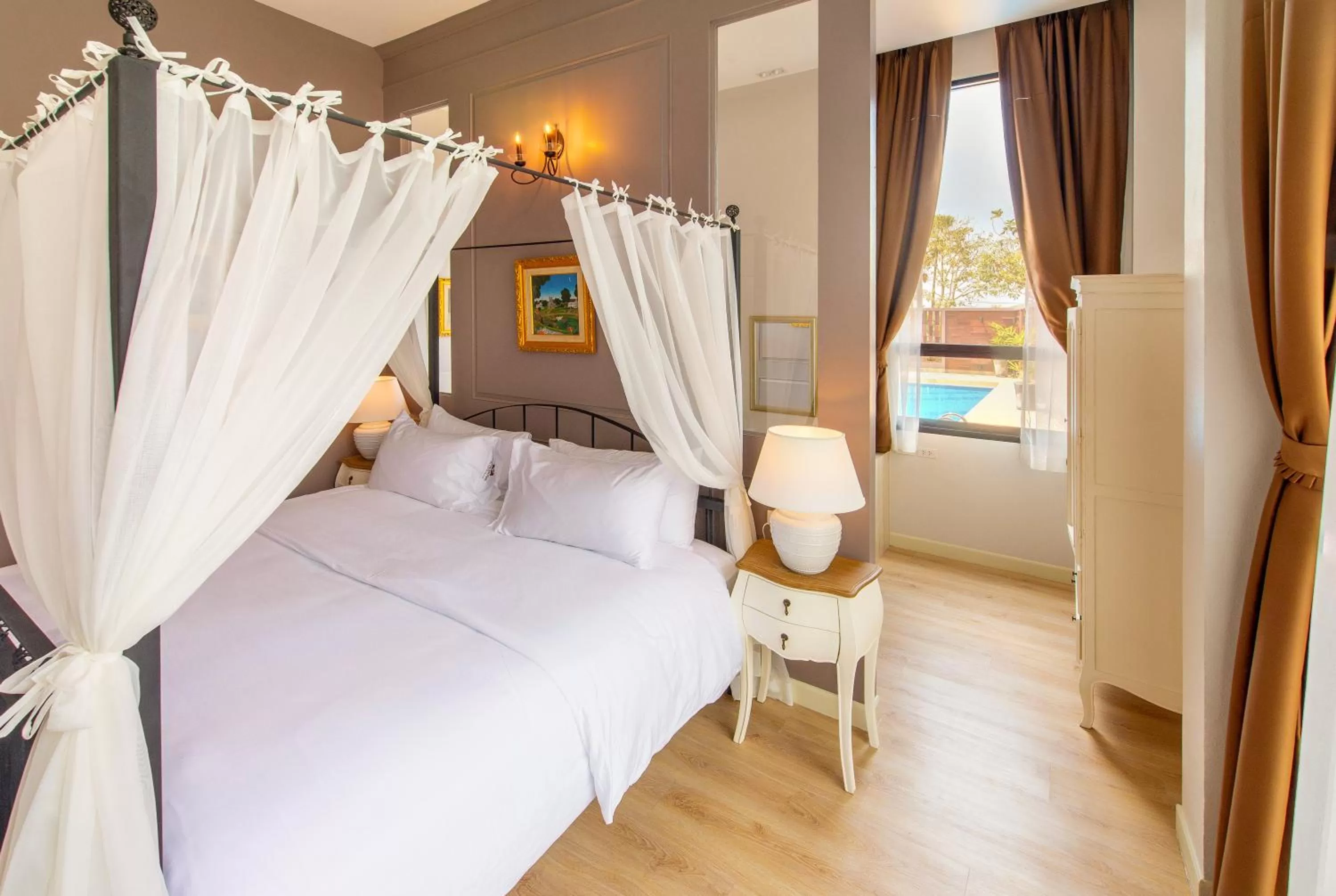 Bed in The Farm House Hotel Ranong