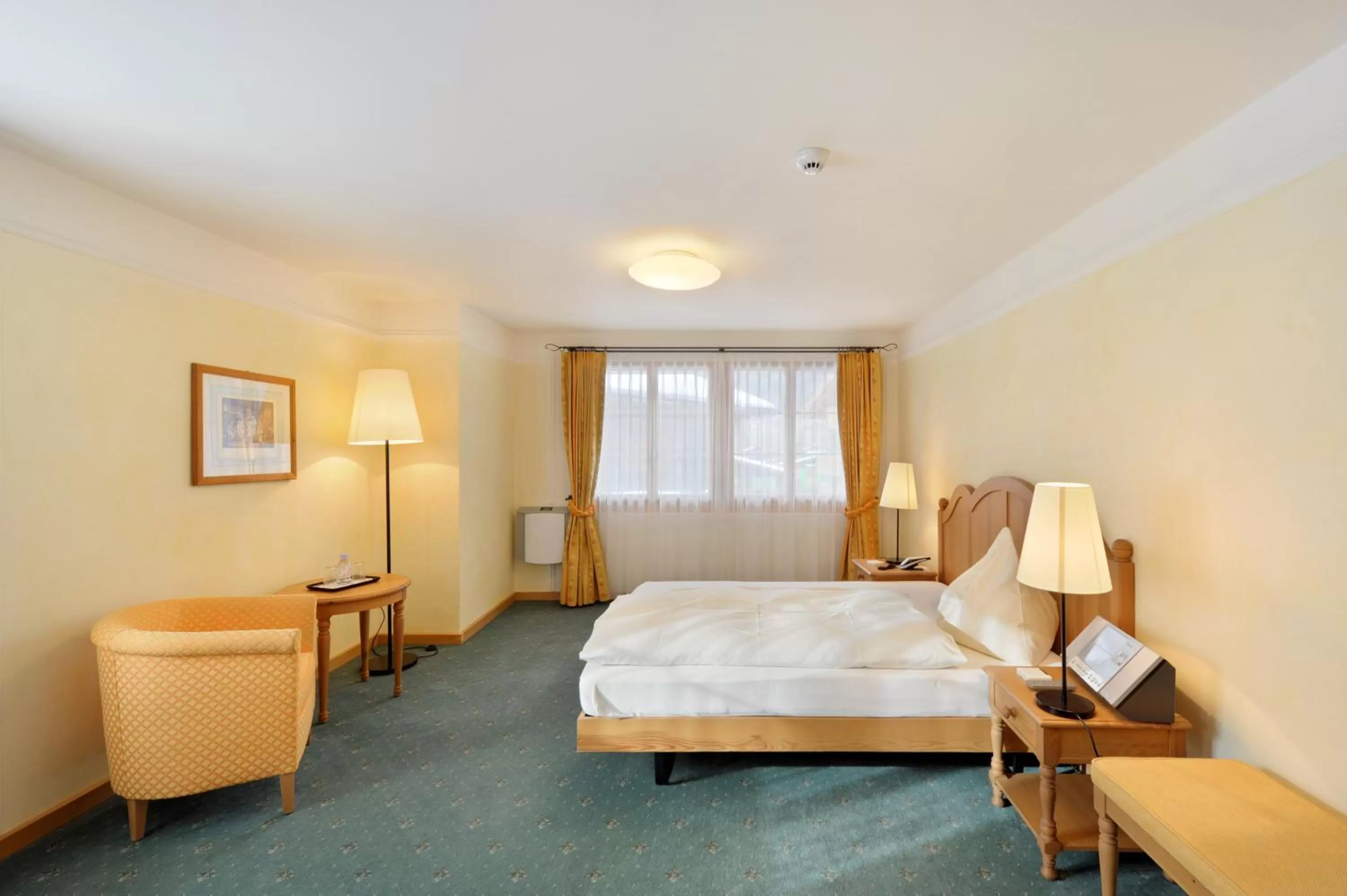 Photo of the whole room, Bed in Hotel Bellerive Gstaad