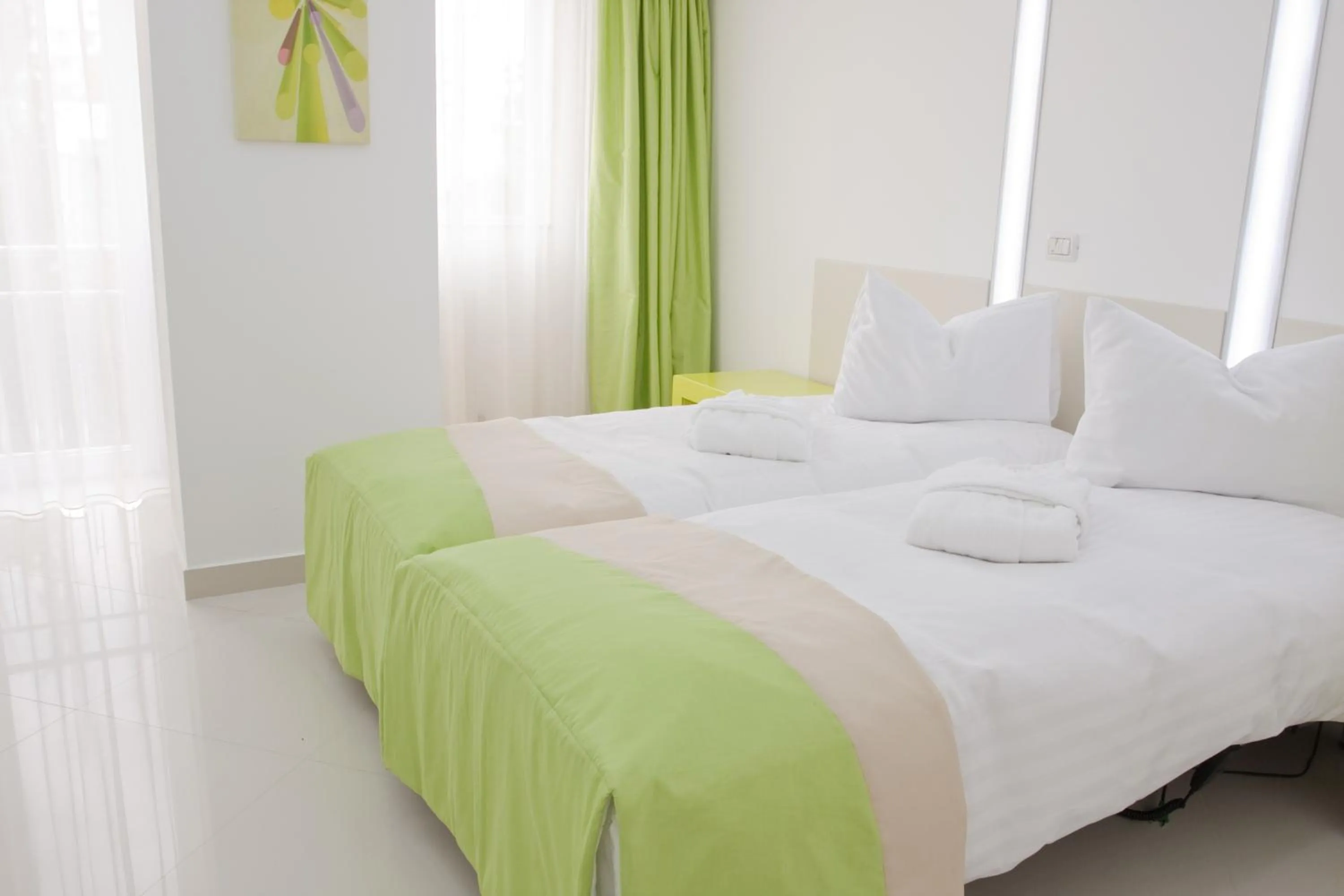 Bed in Christina Hotel