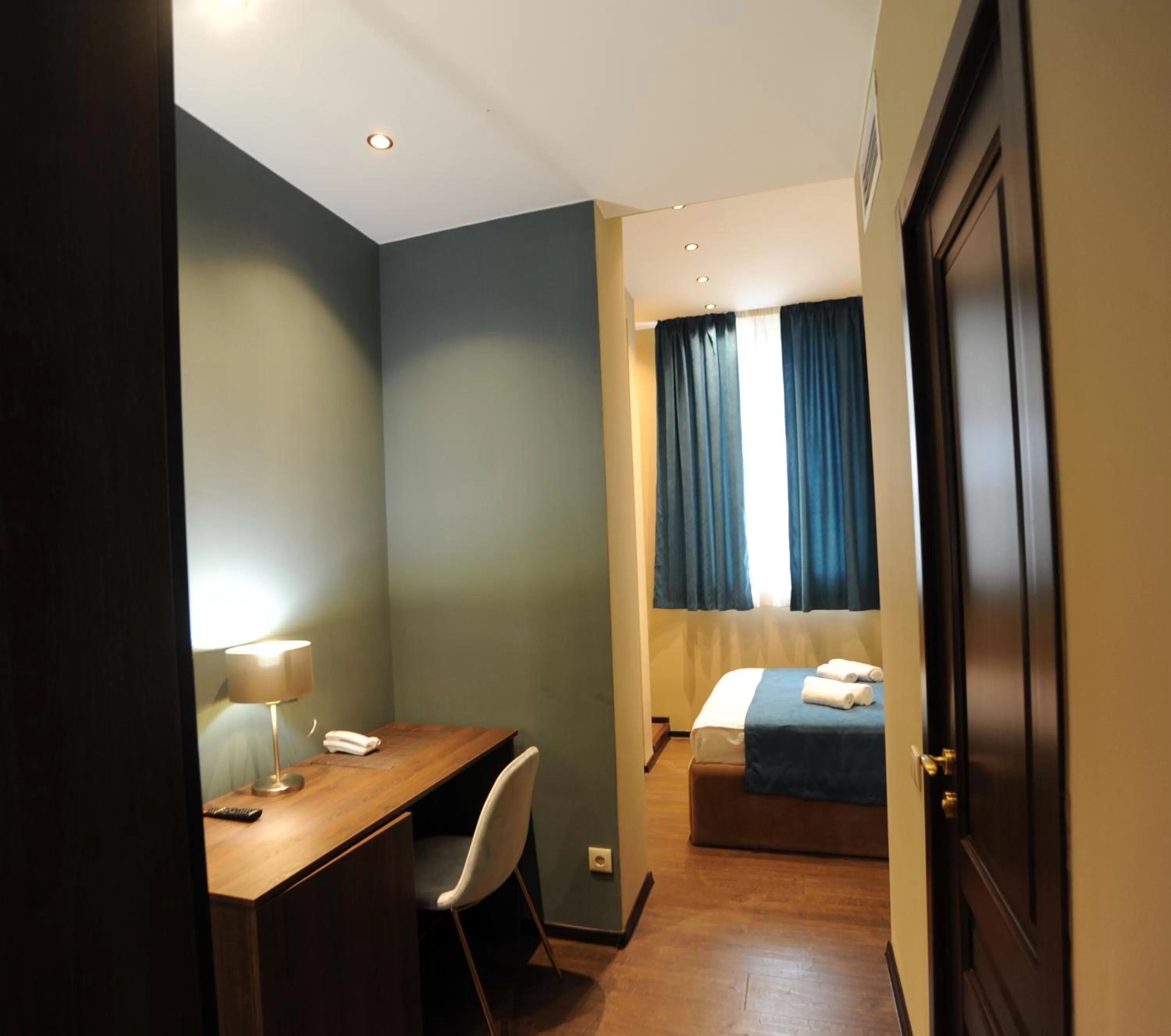 Communal lounge/ TV room, Bed in Hotel Verisima