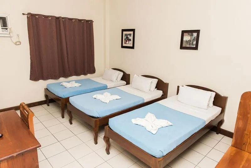 Bed in El Haciendero Private Hotel