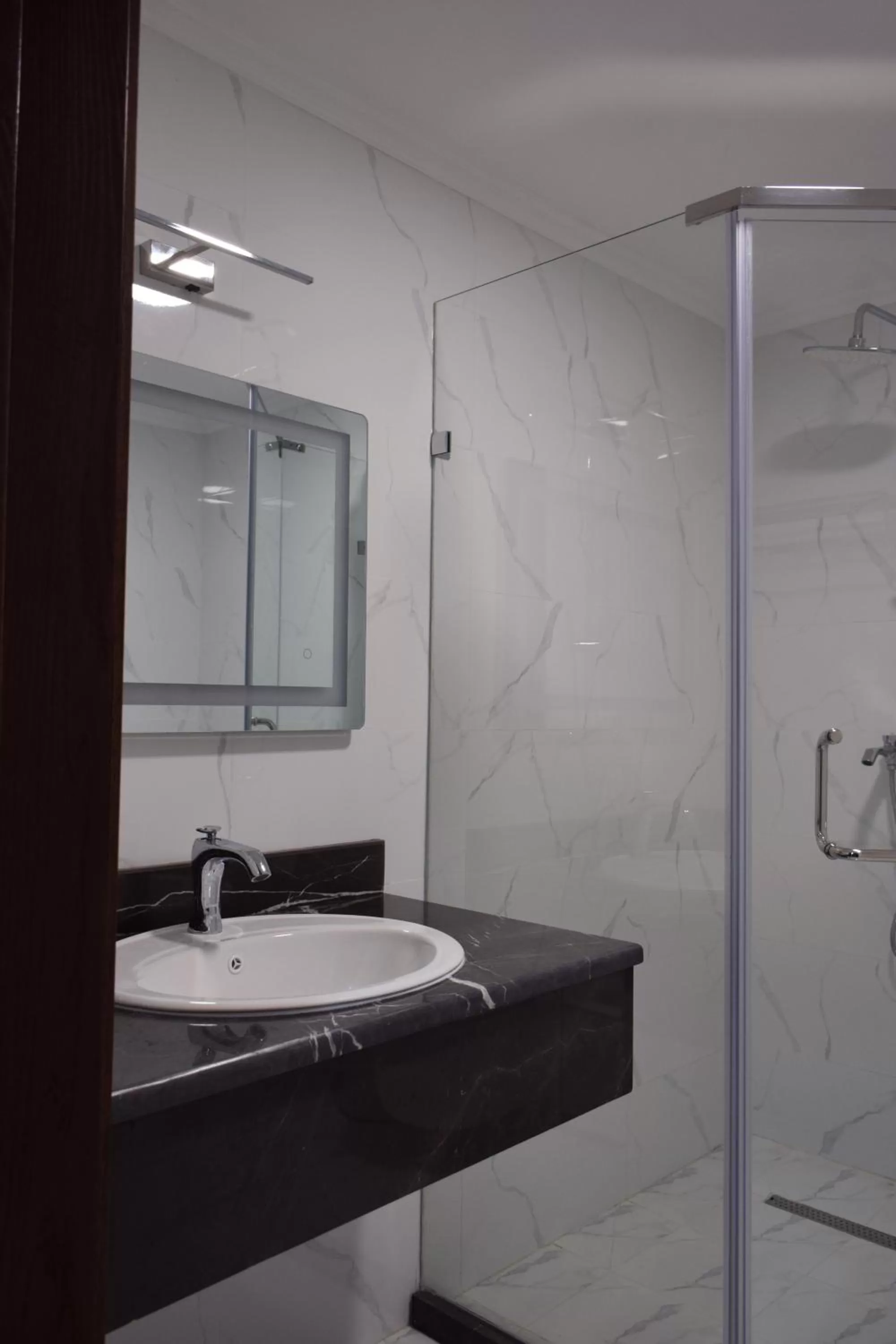 Bathroom in MirOtel Hotel