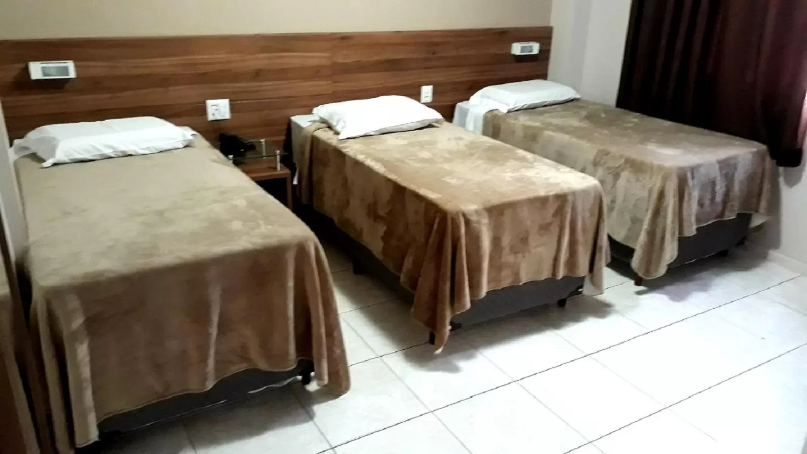 Bed in Brisamar Suite Hotel