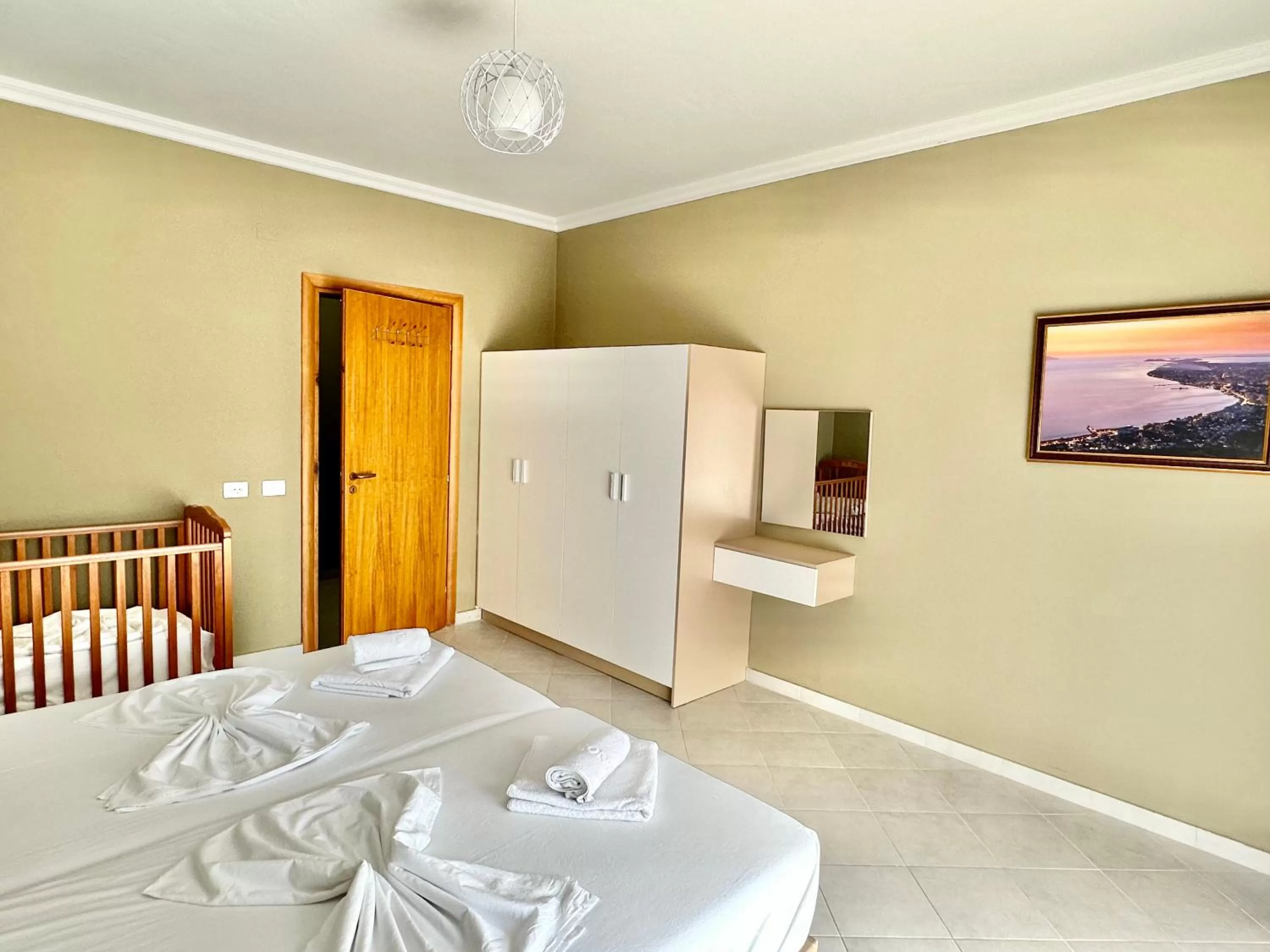 Bed in FAMILY SUITE RESIDENCE