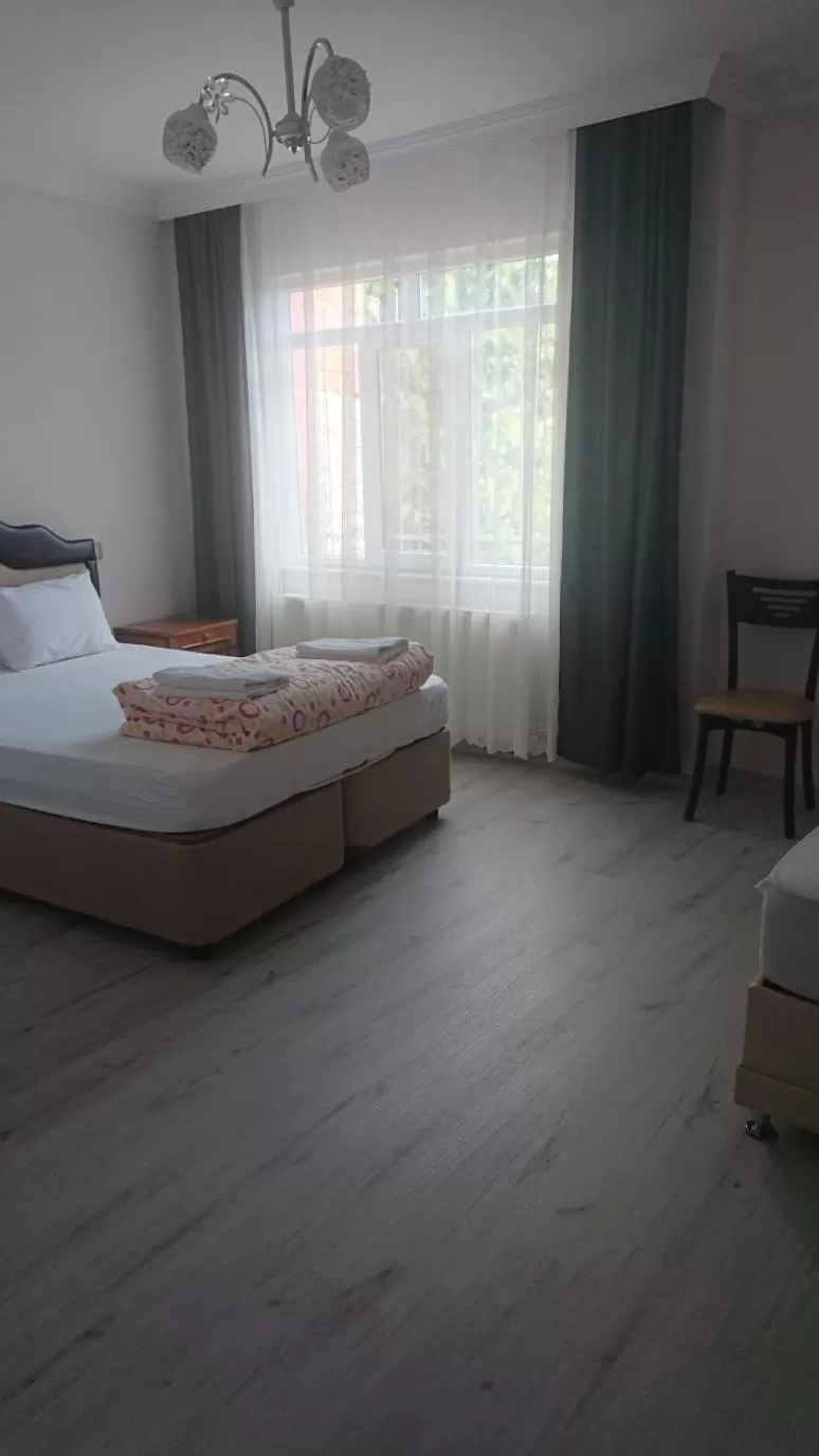 Bed in Ali's Pension