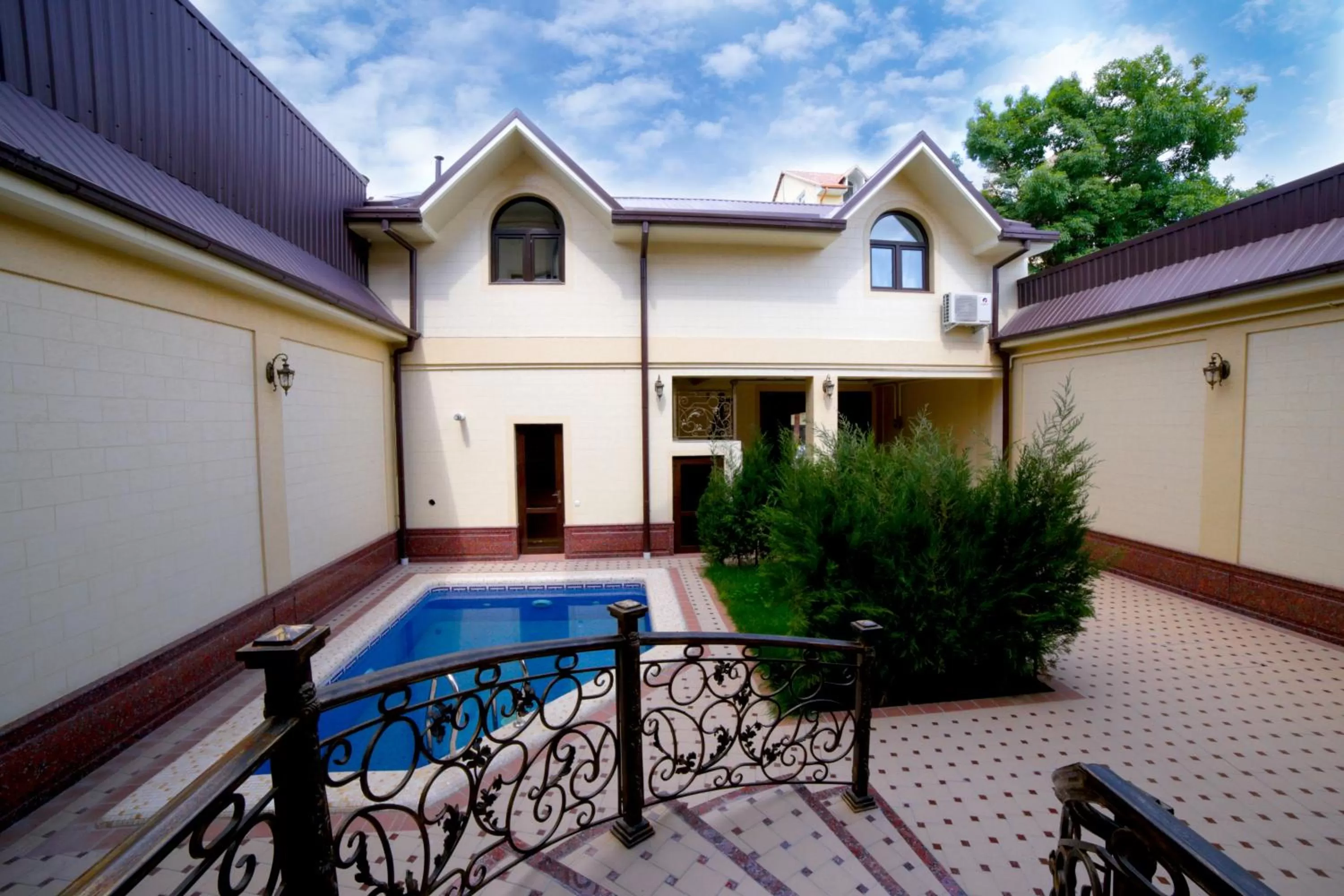 Property building, Swimming Pool in Alliance Hotel Tashkent