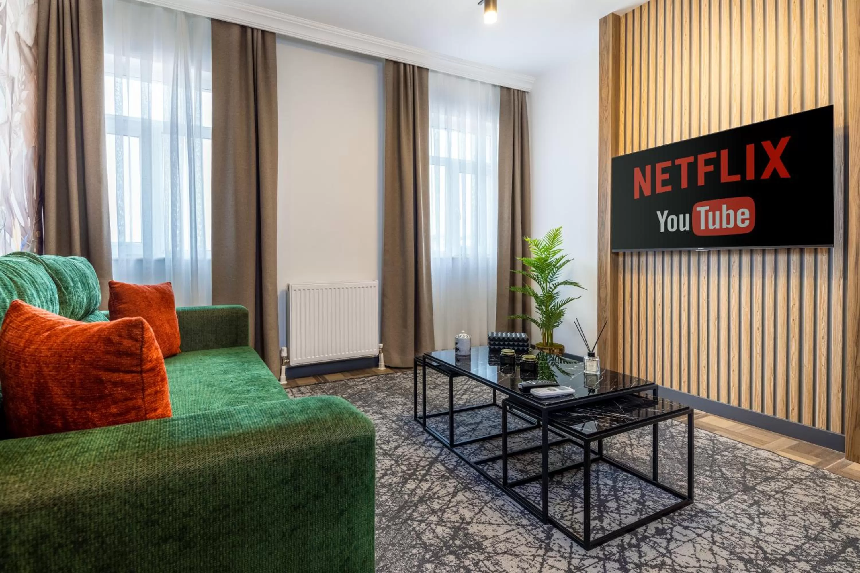 Communal lounge/ TV room in BayMari Suites City Life