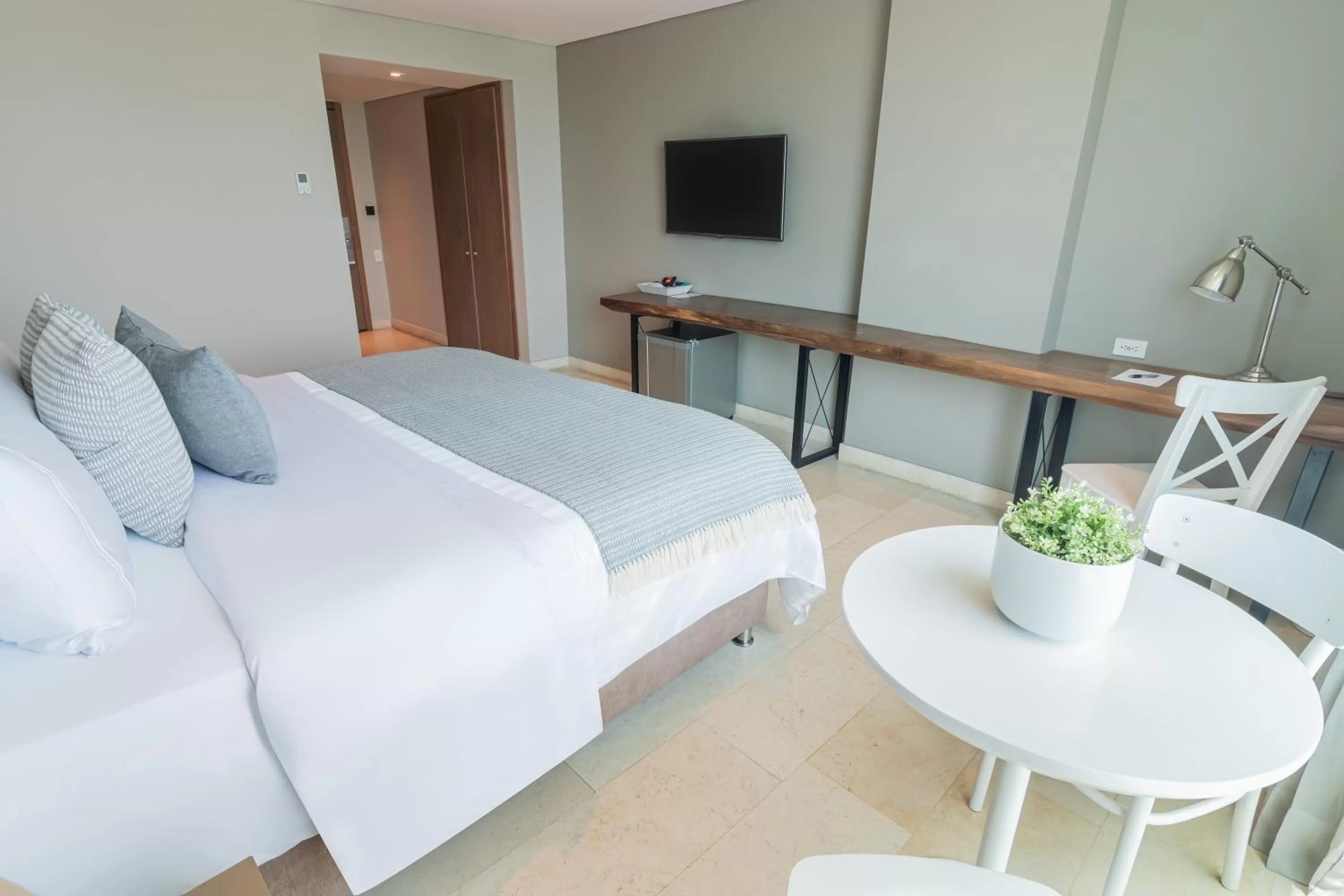 Bed in GHL San Lazaro Art Hotel