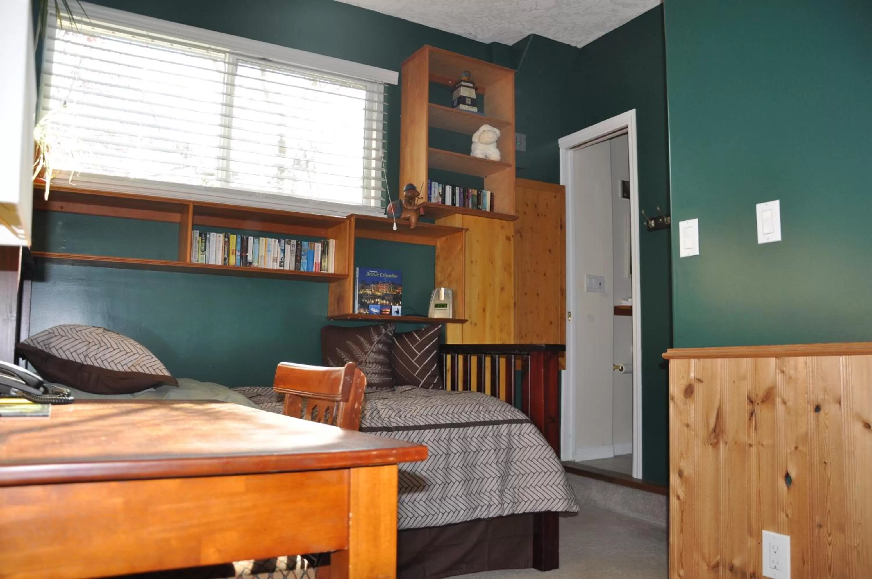 Bedroom in Birds of a Feather Victoria Oceanfront Studio Suites