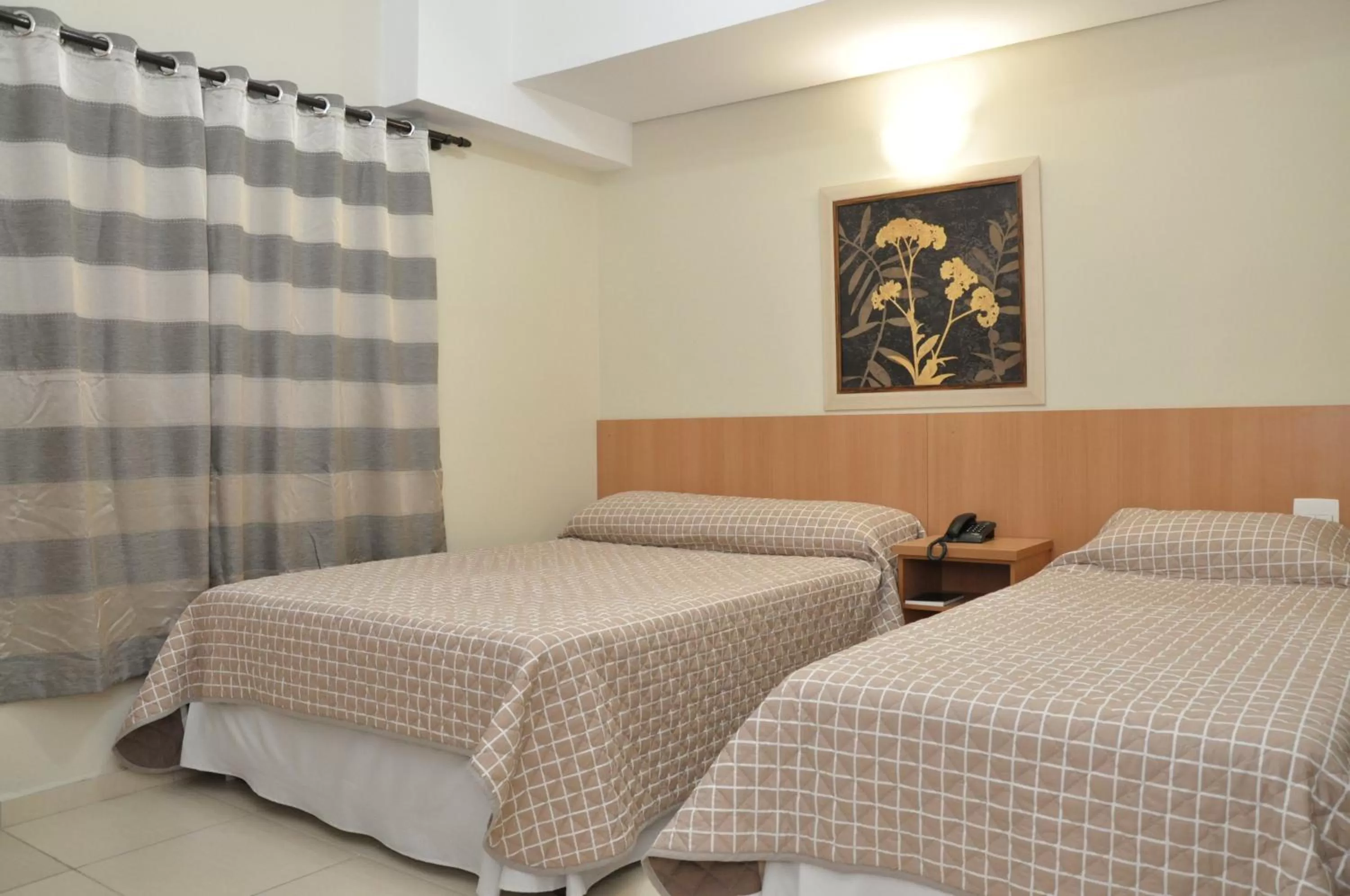 Bed, Room Photo in Lotus Hotel - à 6 km do Santuário de Aparecida-SP