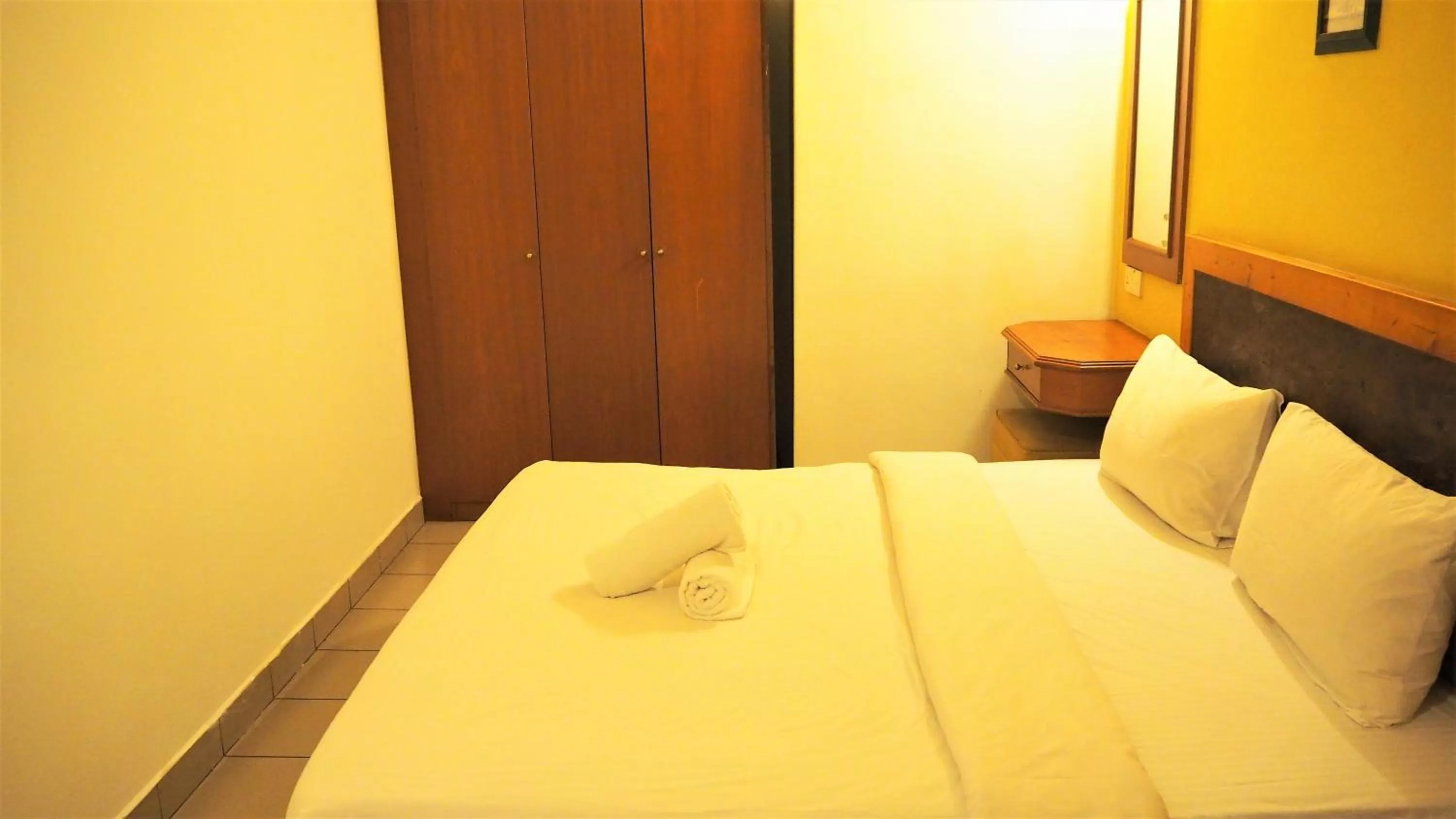 Bed in Leo Palace Hotel Classic Wing, WTC Kuala Lumpur