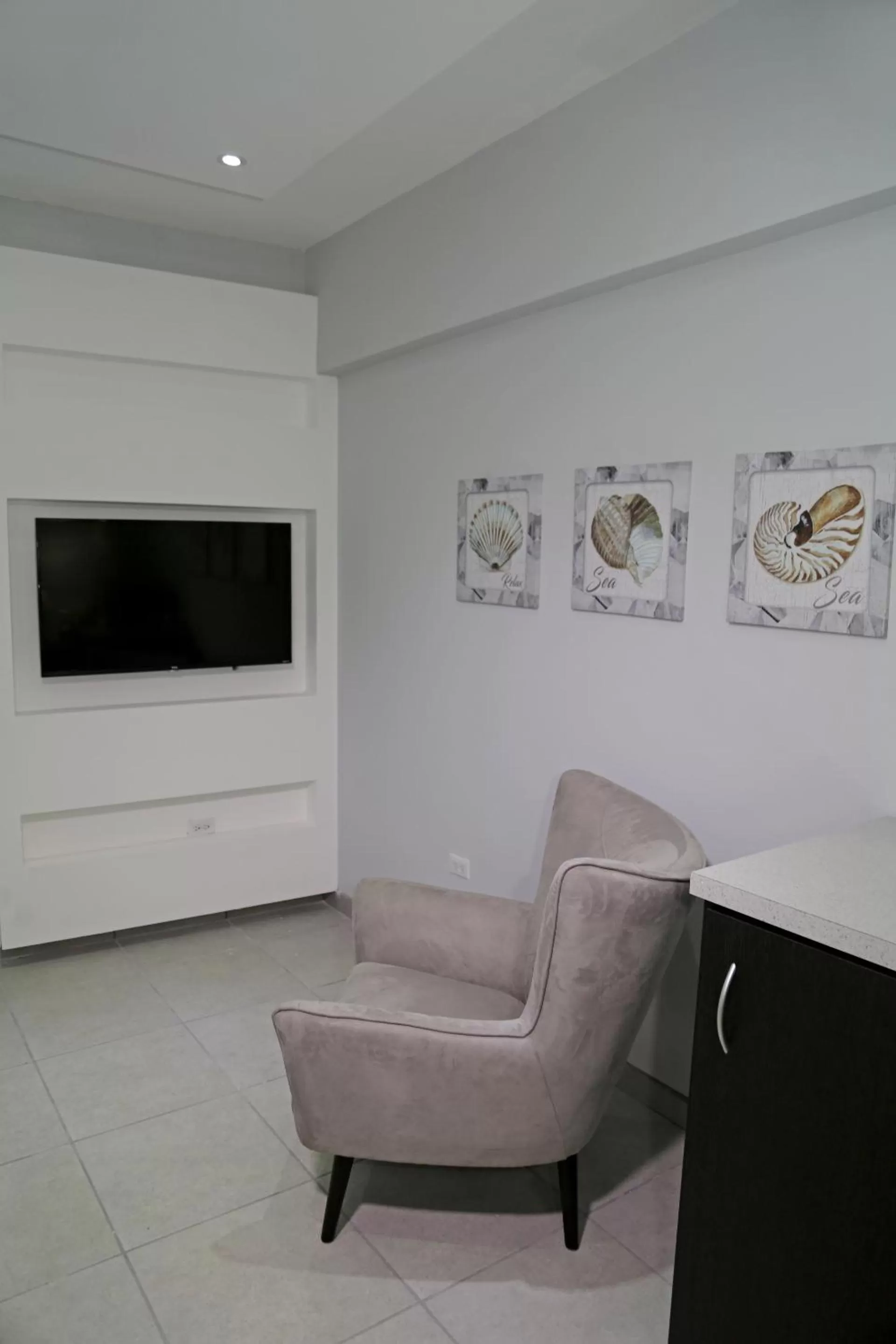 TV and multimedia, Seating Area in Itza-Bella Suites