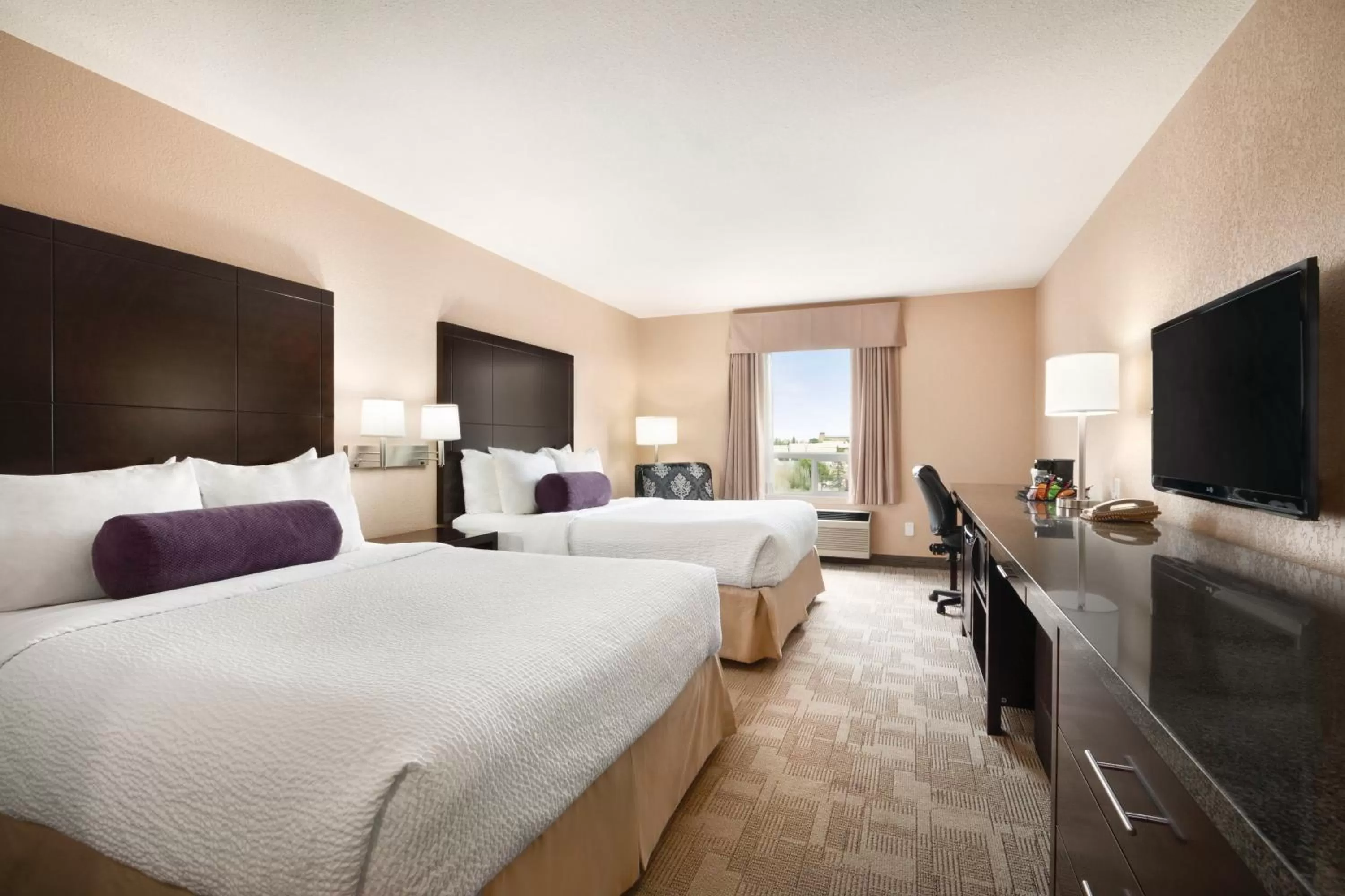 Bed in Days Inn by Wyndham Calgary Airport