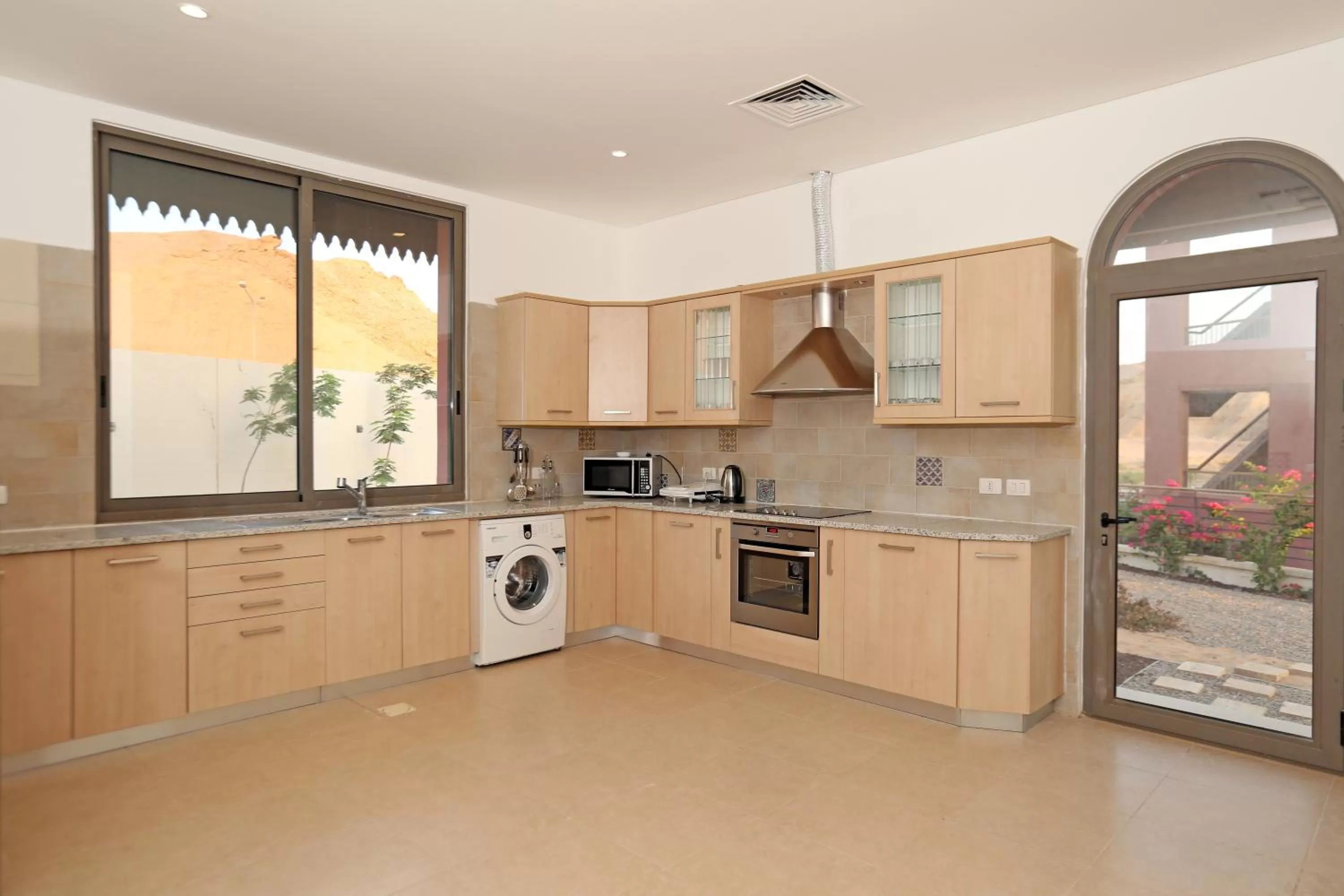 Kitchen or kitchenette in Tala Bay Residence - Families Only
