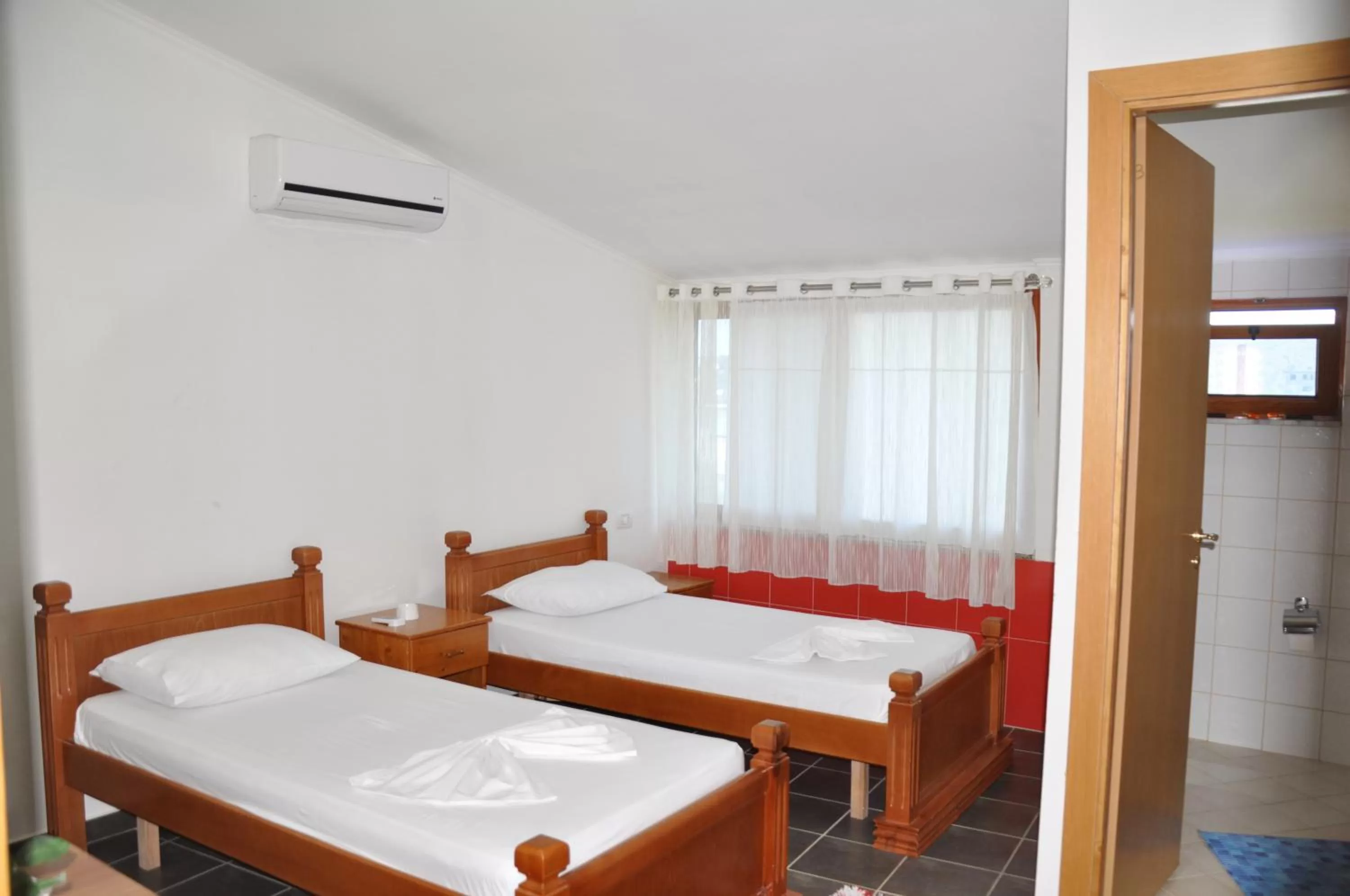 Photo of the whole room, Bed in Hotel Floga