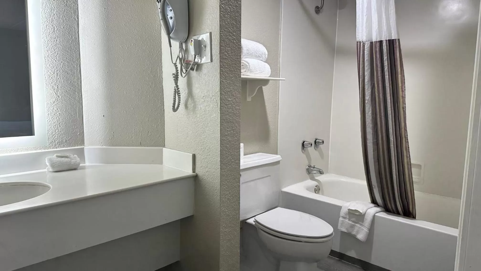 Bathroom in Days Inn by Wyndham San Diego Vista