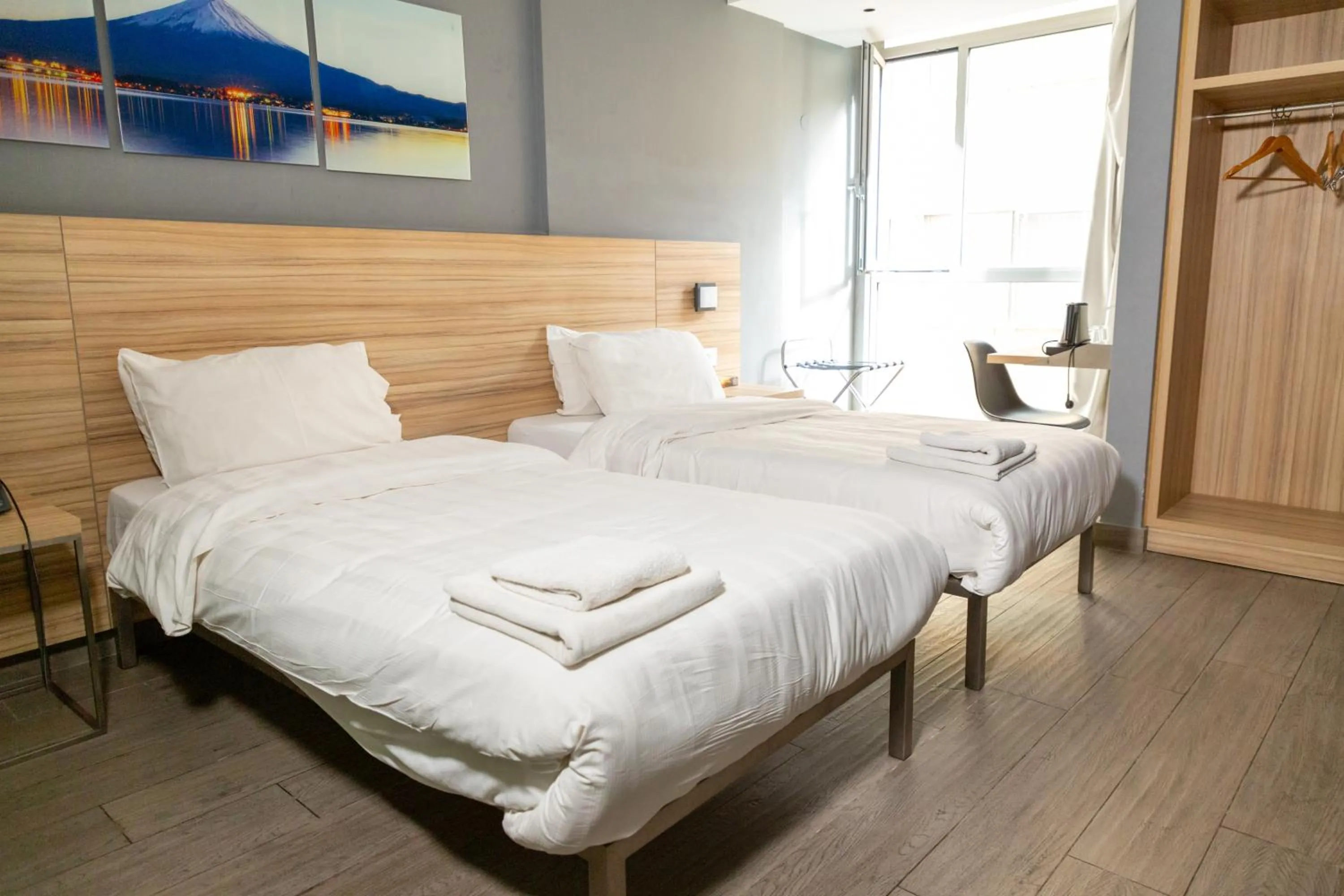 Bed in Caramel Boutique Hotel