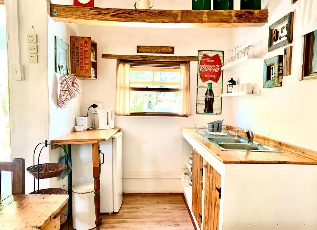 Kitchen/Kitchenette in Brakdakkie Guest Cottages
