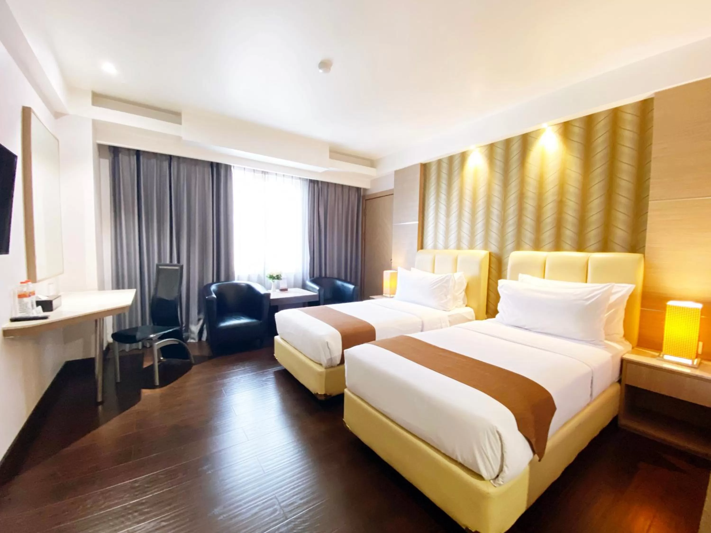 Bed in Orchardz Hotel Industri Jakarta Kemayoran