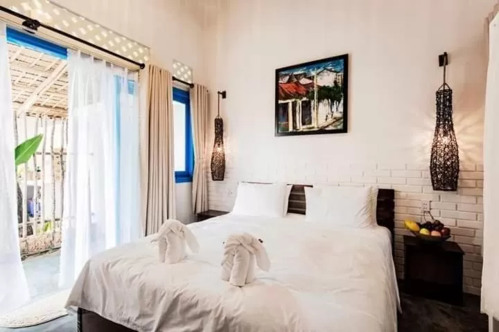 Bed in Cashew Tree Bungalow