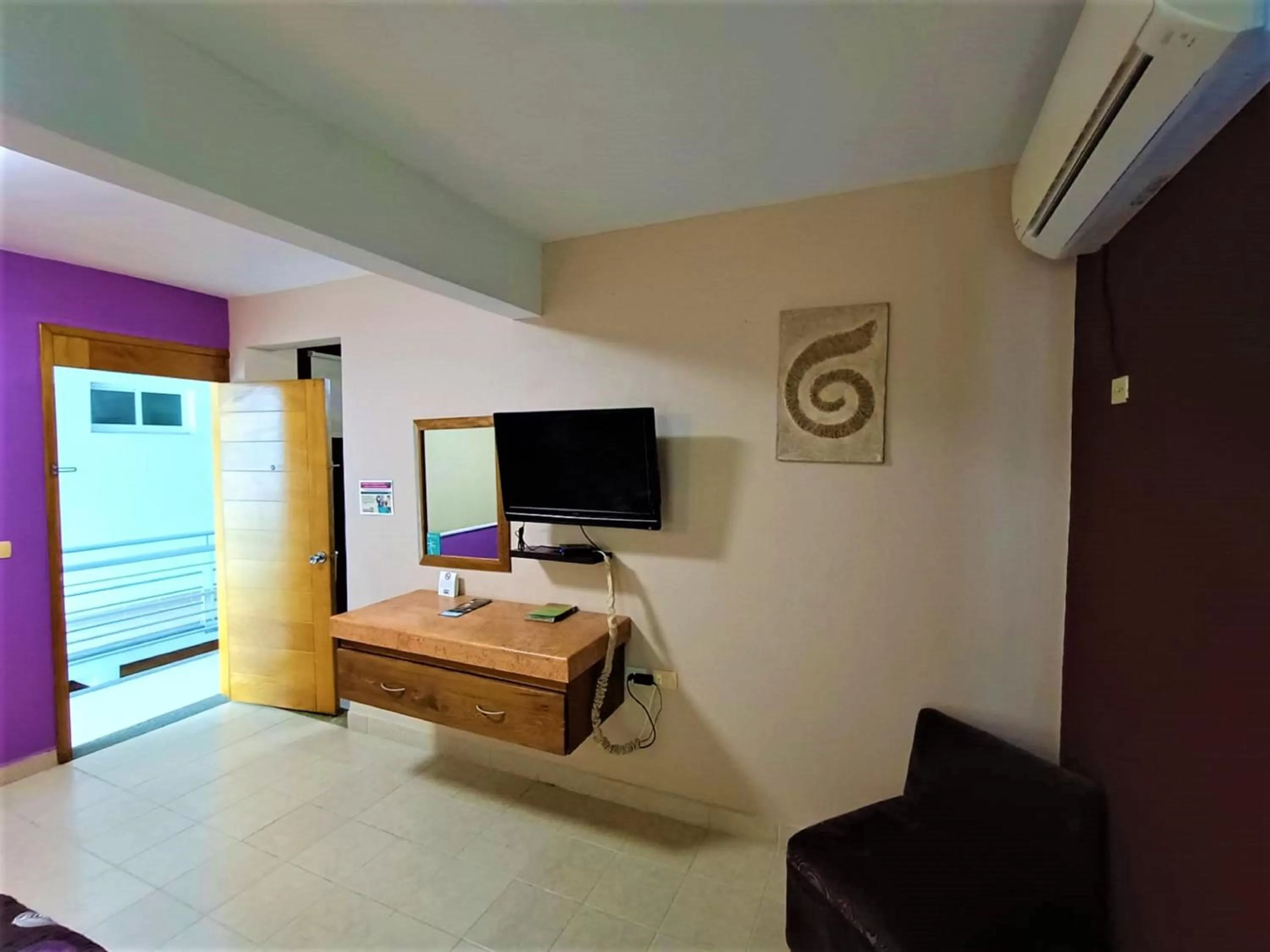 Photo of the whole room in Hotel Santo Domingo Express