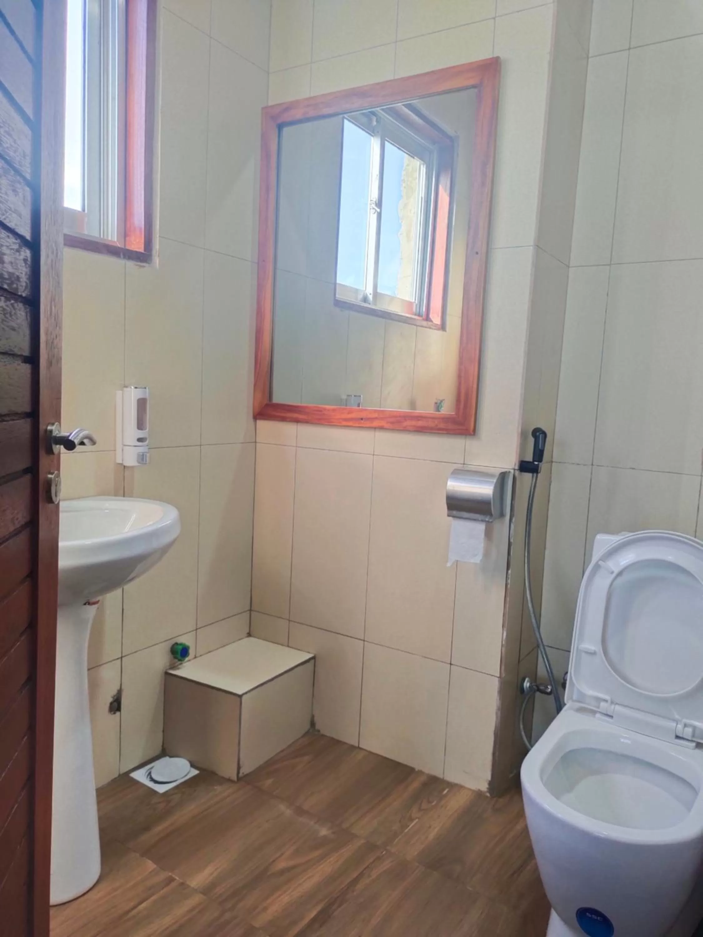 Toilet, Bathroom in Serene Beach Resort