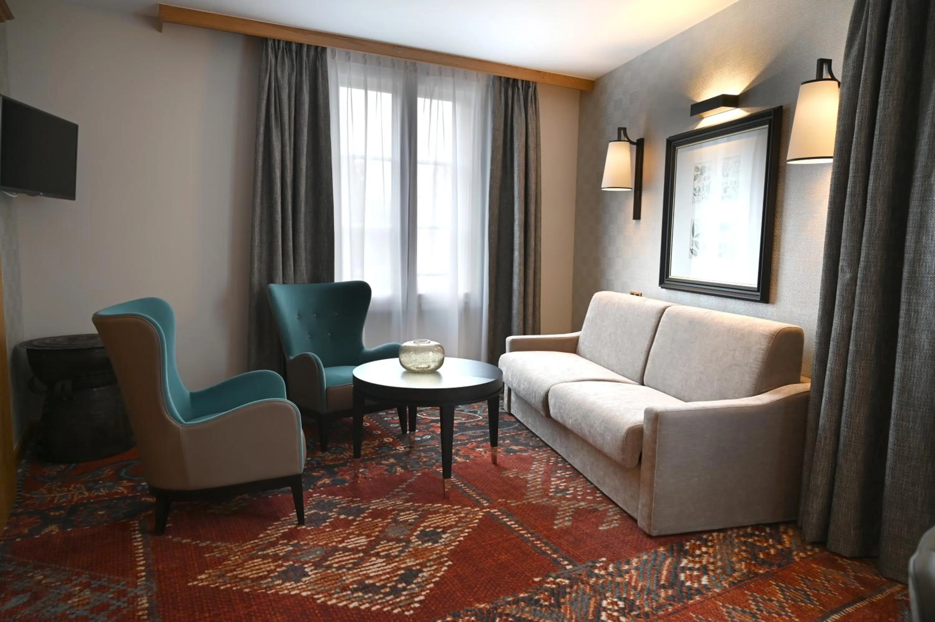 Living room in Hôtel Le Rempart