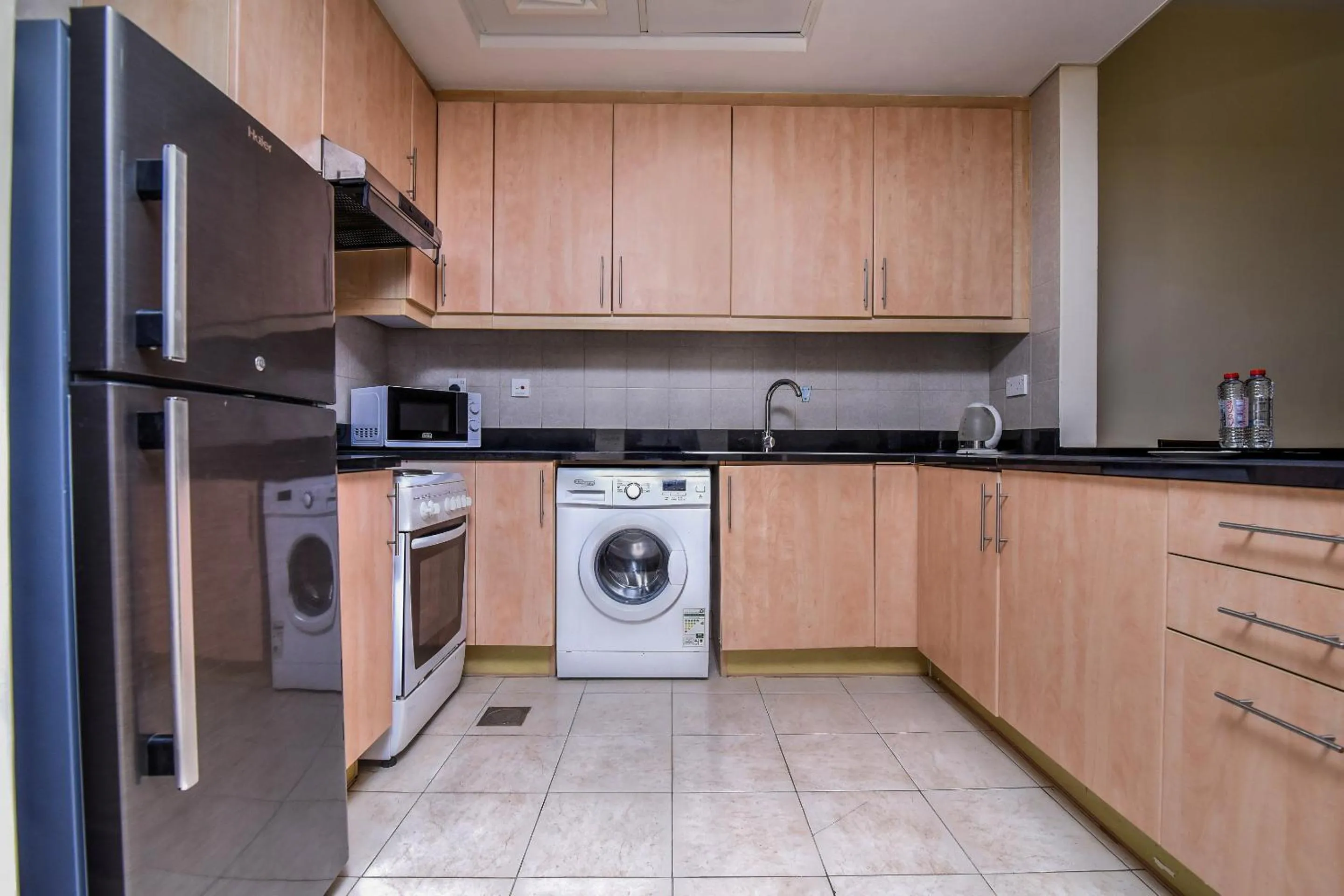 Kitchen or kitchenette in Parkside Hotel Apartment