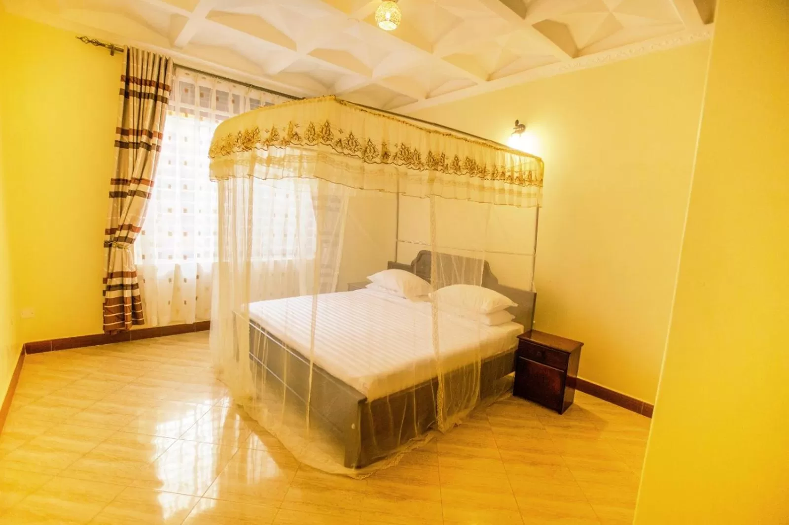 Bedroom in Kampala Suburbs Apartment