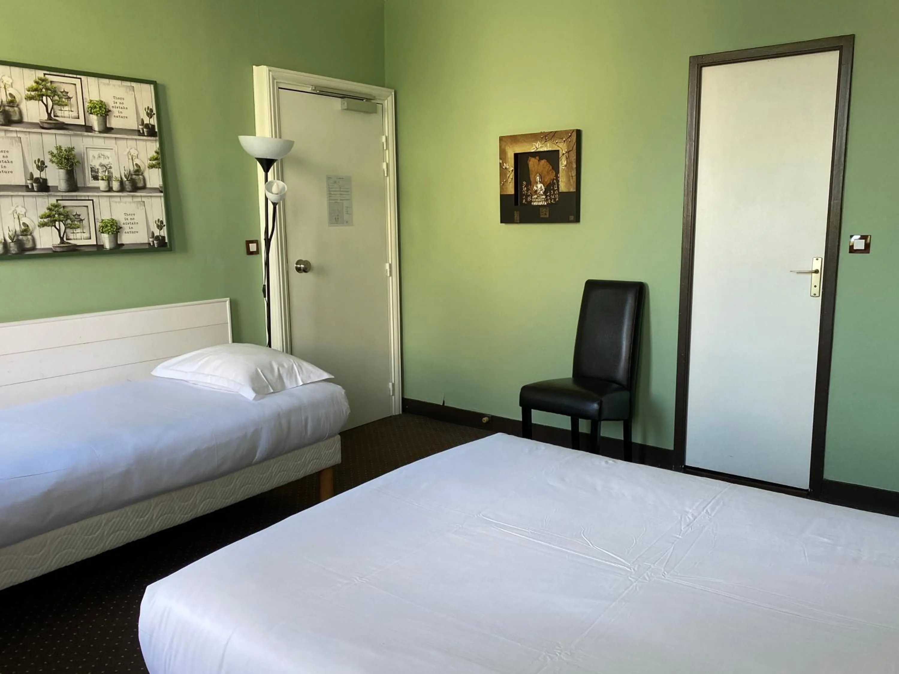 Bed in Hotel Colbert