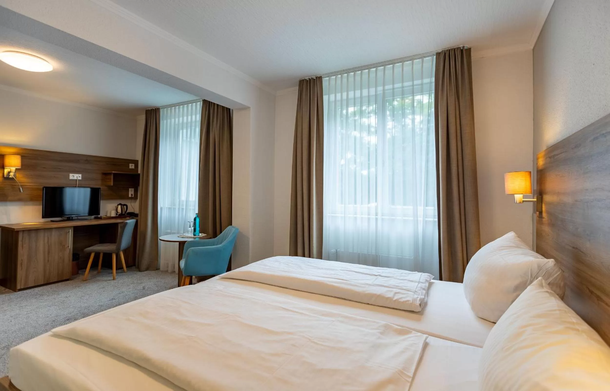 Photo of the whole room, Bed in Waldhotel Eskeshof