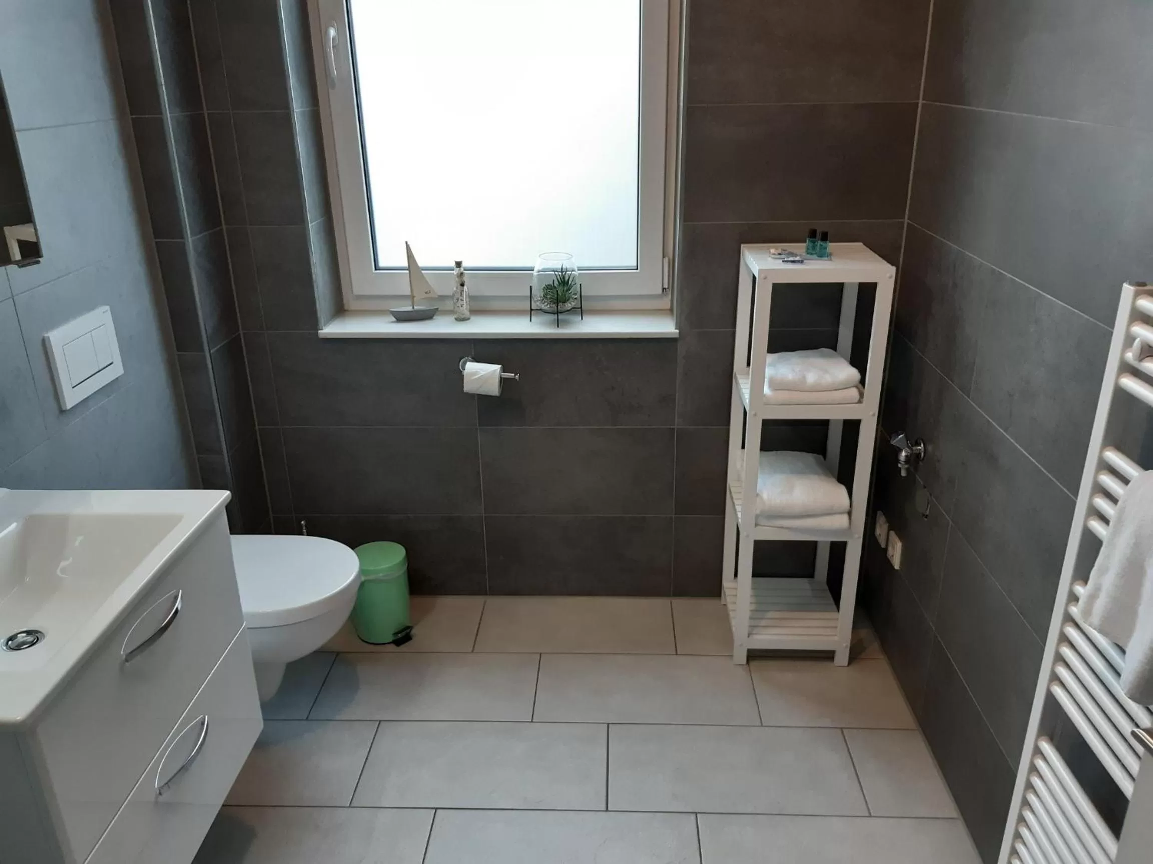 Bathroom in Hotel M24 - Alle Zimmer mit Küchenzeile