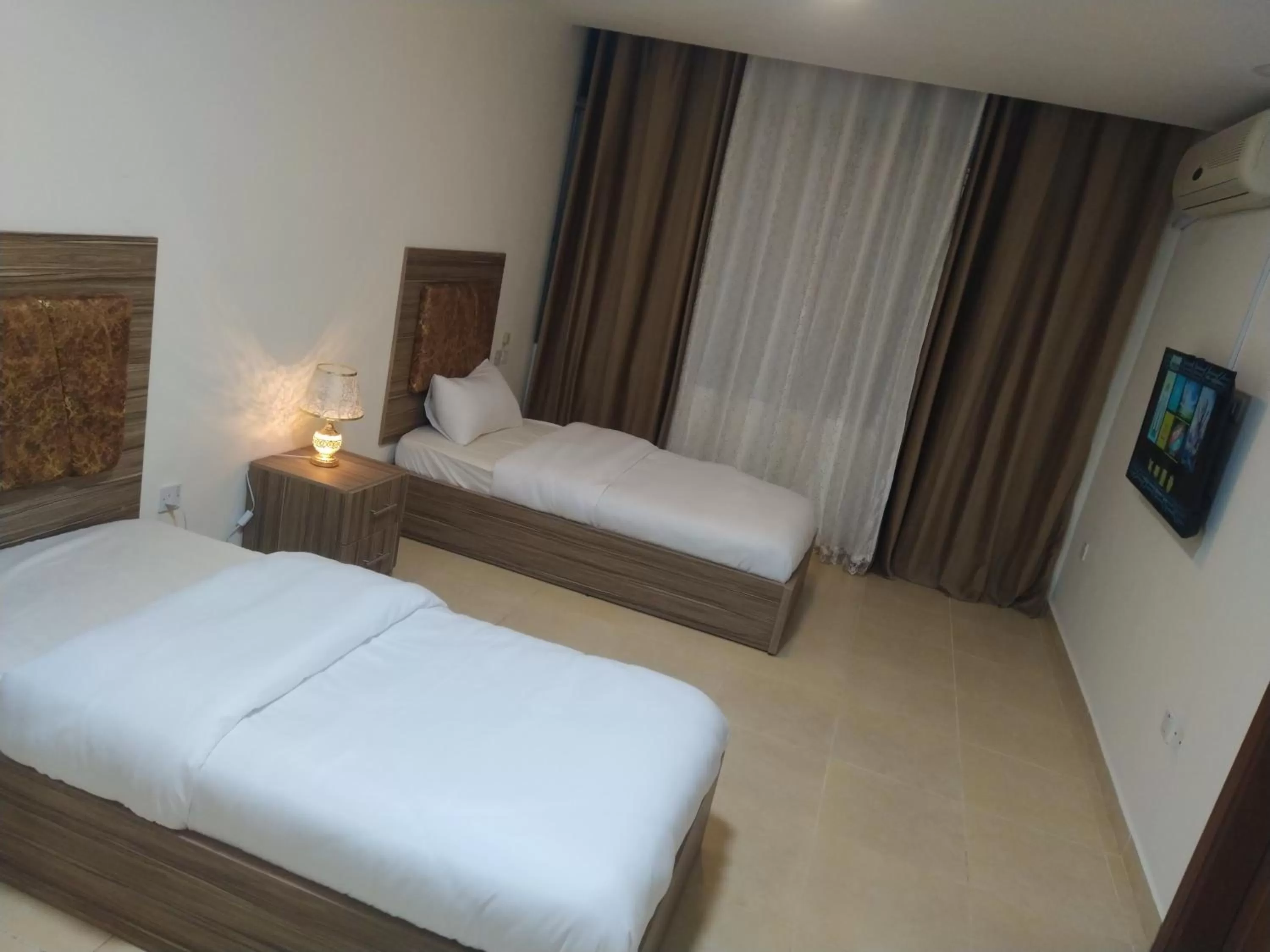 Photo of the whole room, Bed in Rayan Hotel Suites