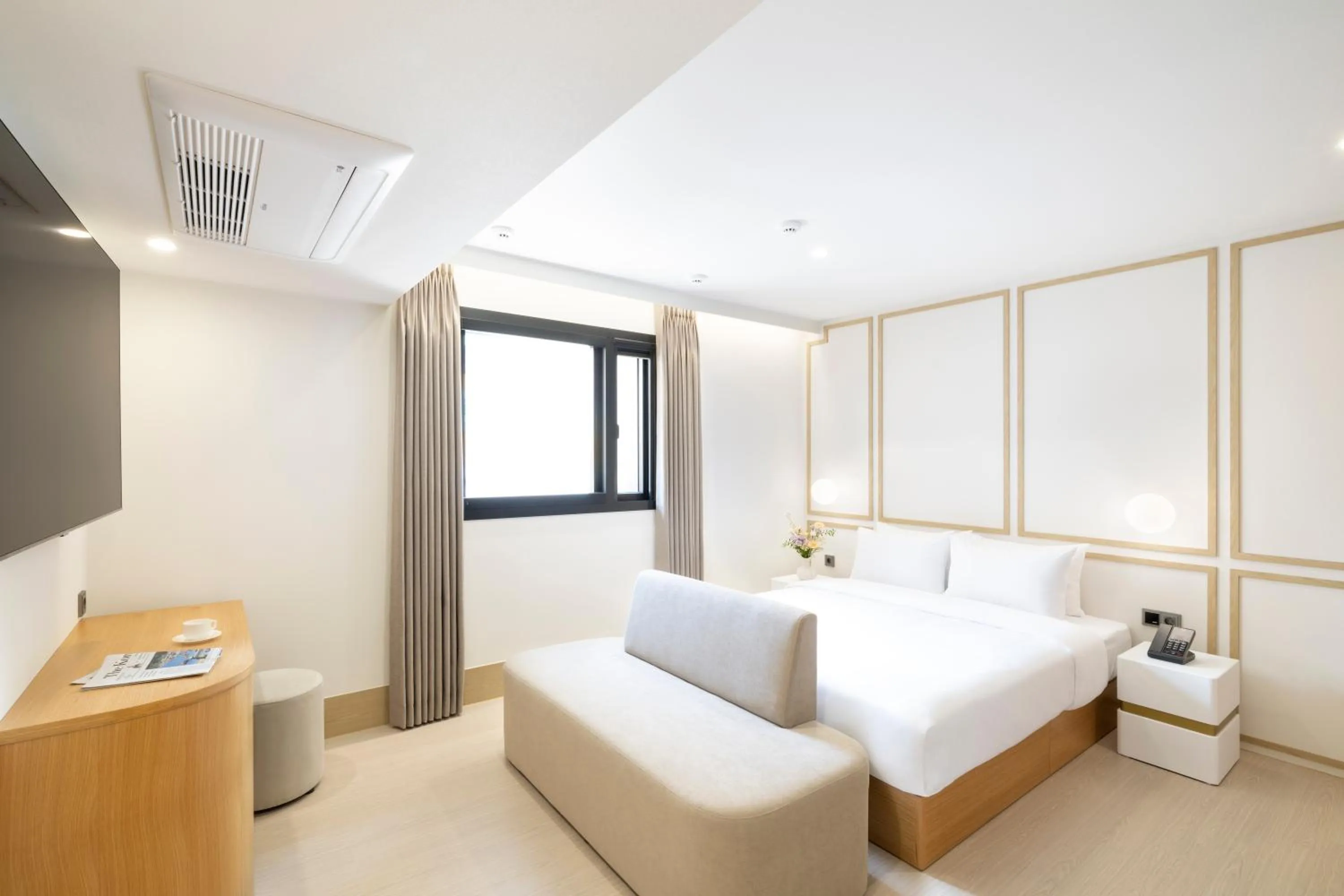 Bed in Jjak Boutique Hotel