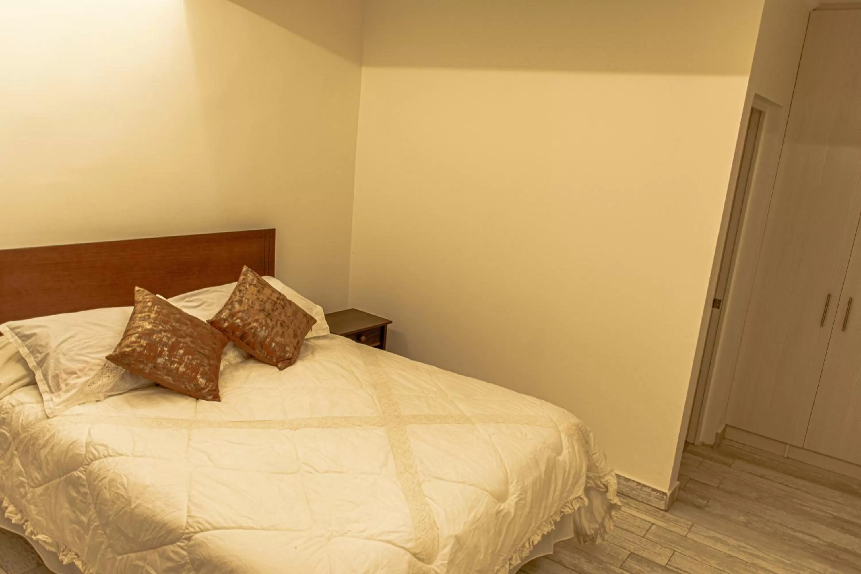 Bed in Hotel Boutique Suri