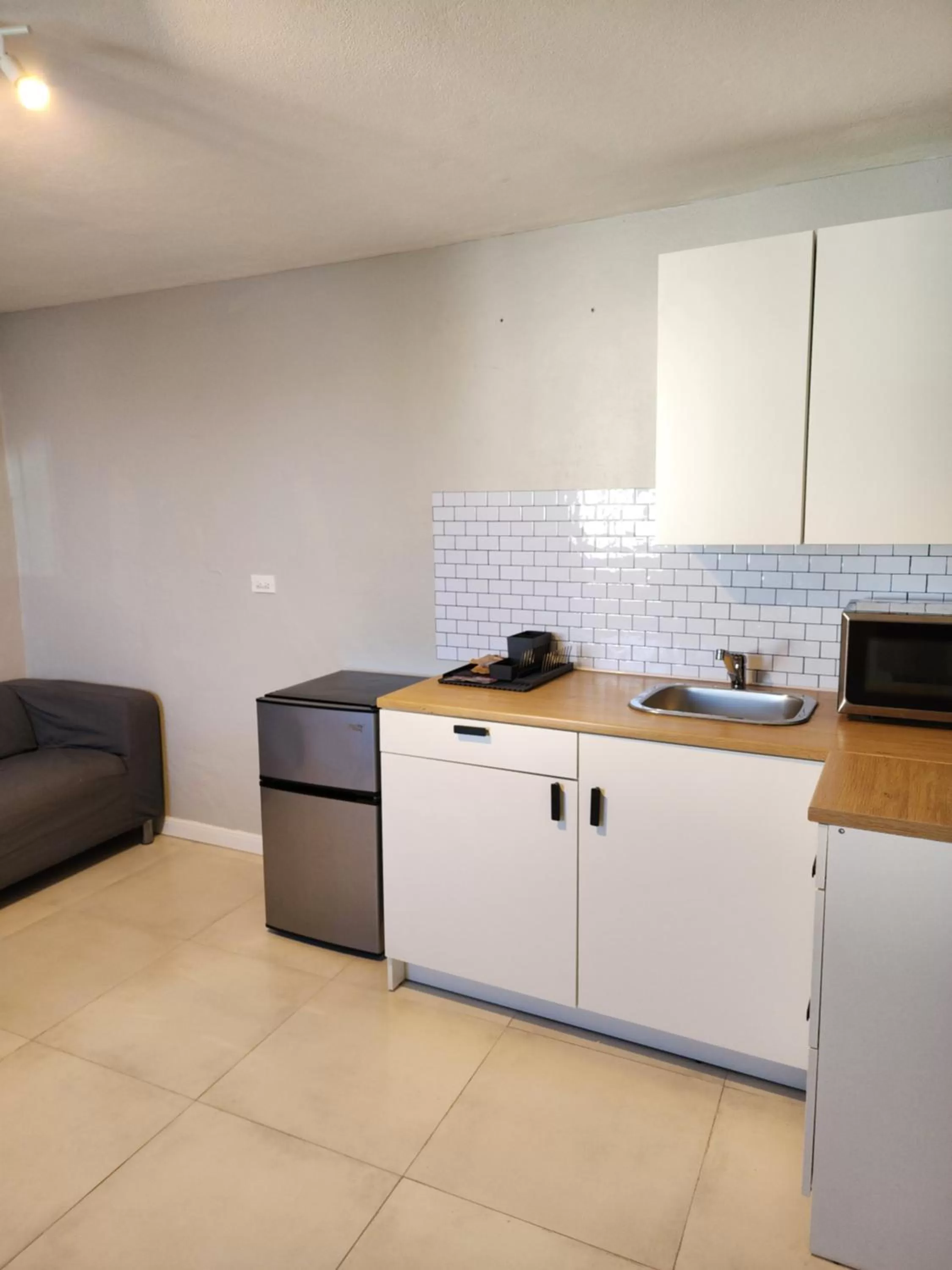 Kitchen or kitchenette in Luxe Beach Resort