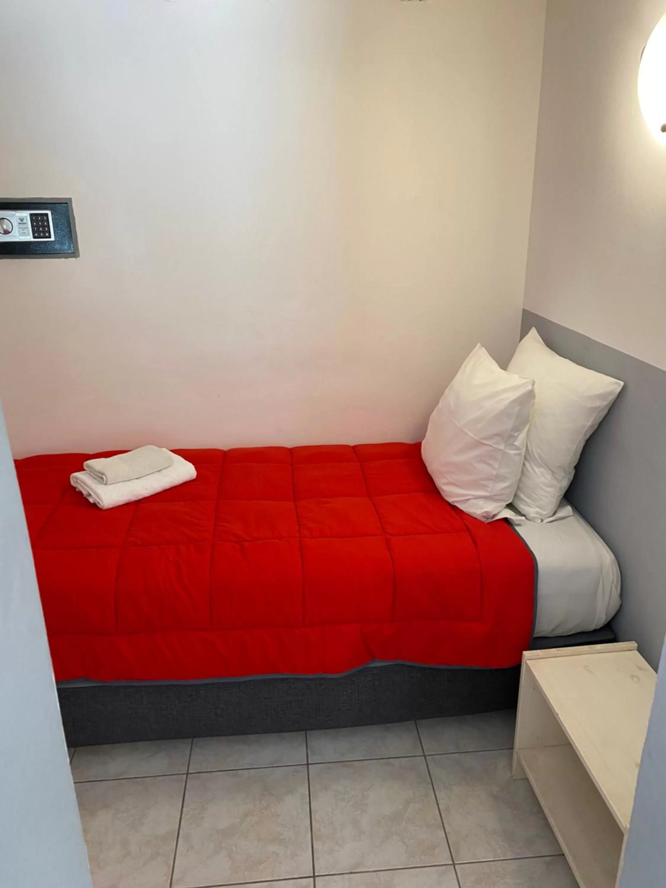 Bed in LOGIS Hôtel La Chaumière