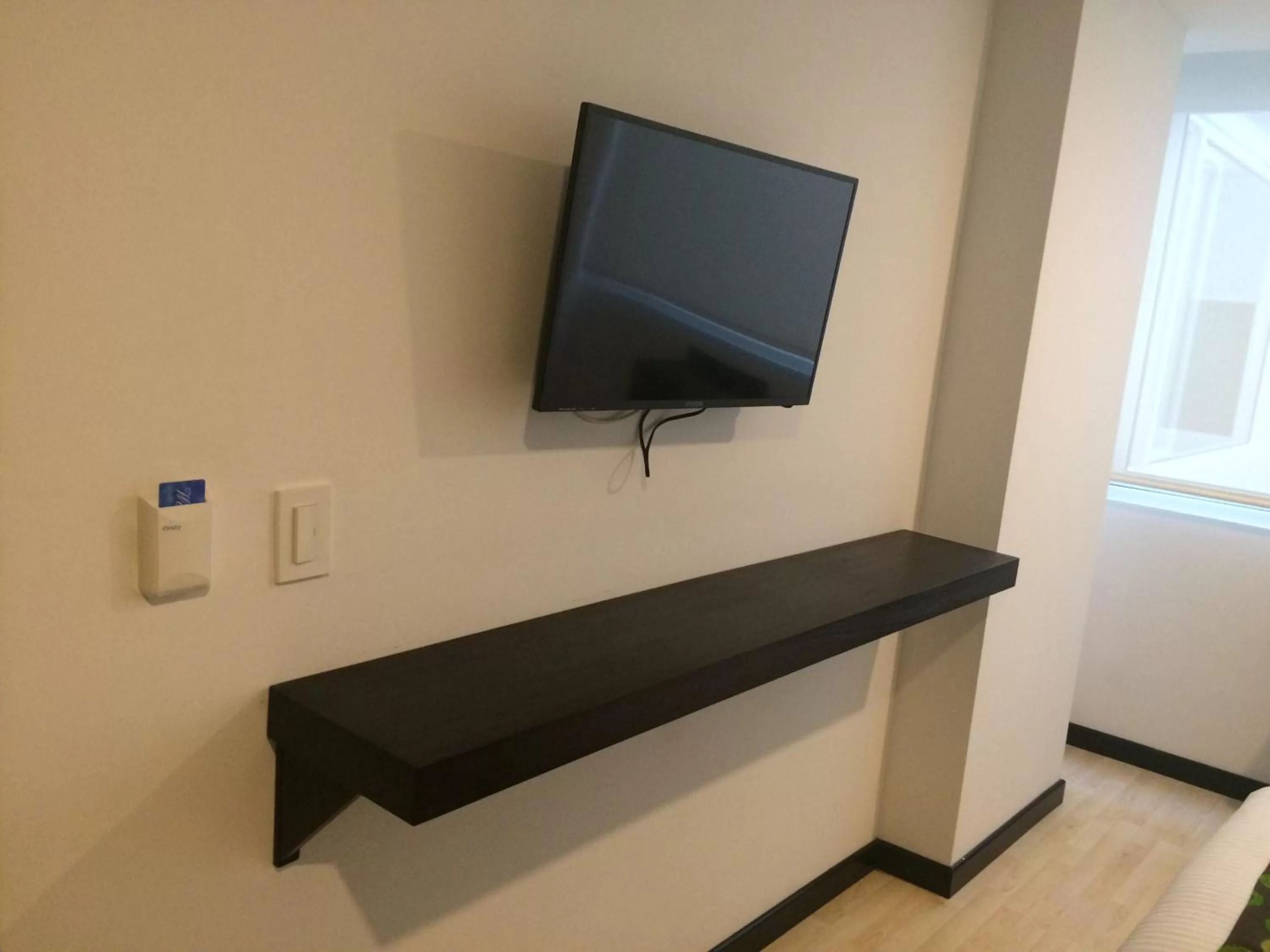 Bedroom, TV/Entertainment Center in Hotel H53