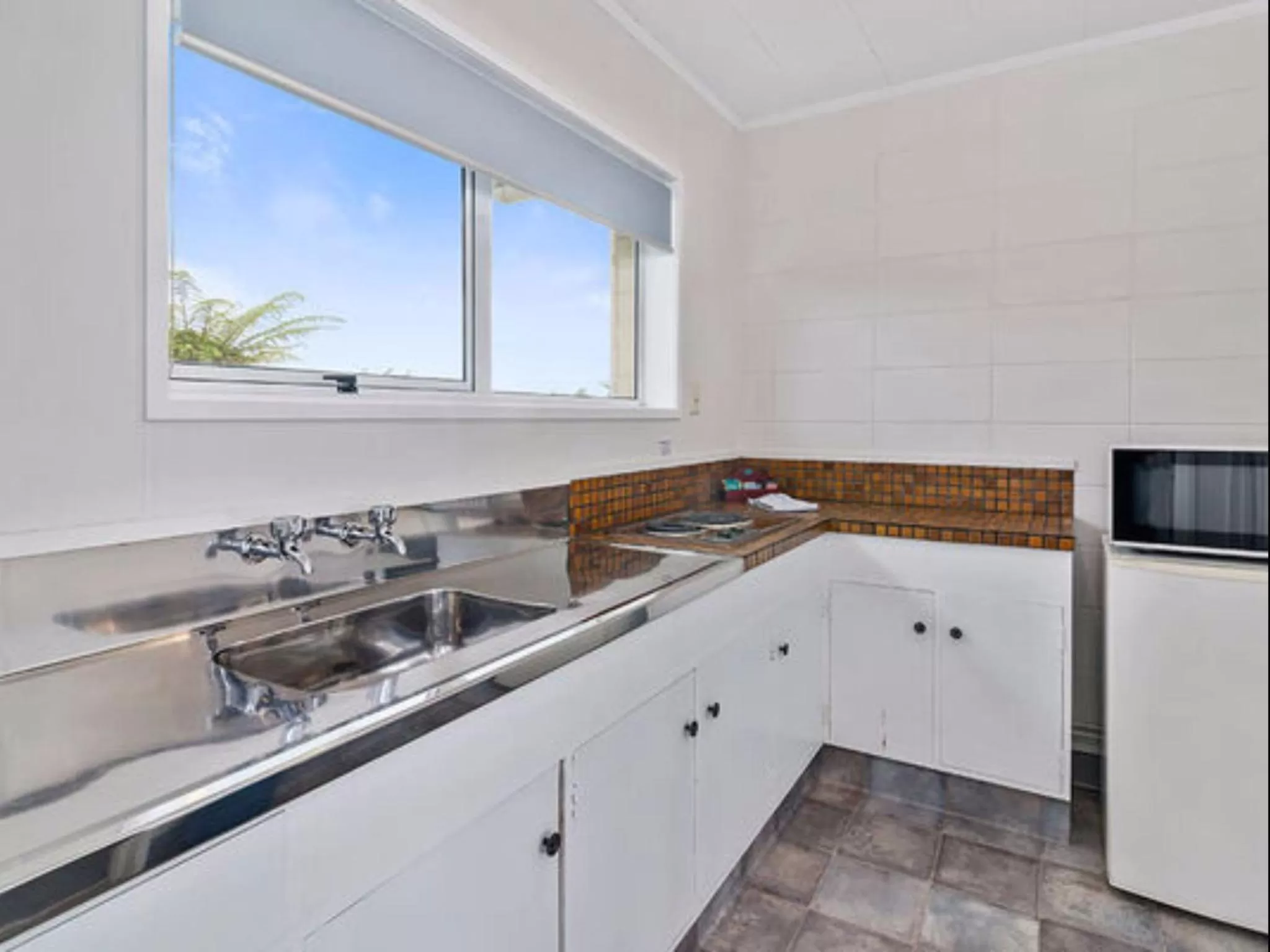 Kitchen or kitchenette in ASURE Cleveland Rotorua