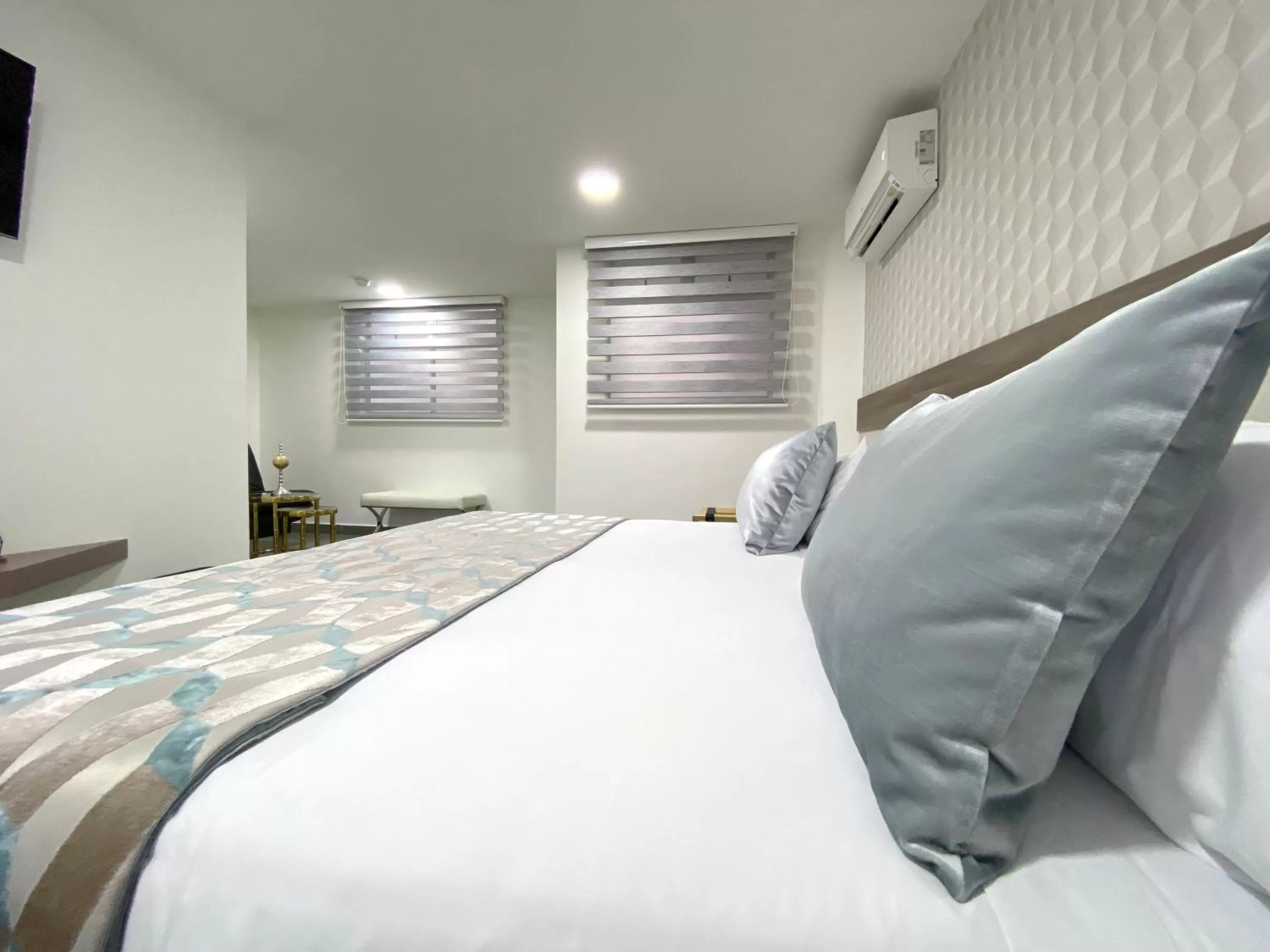 Bed in Seven Inn Hotel