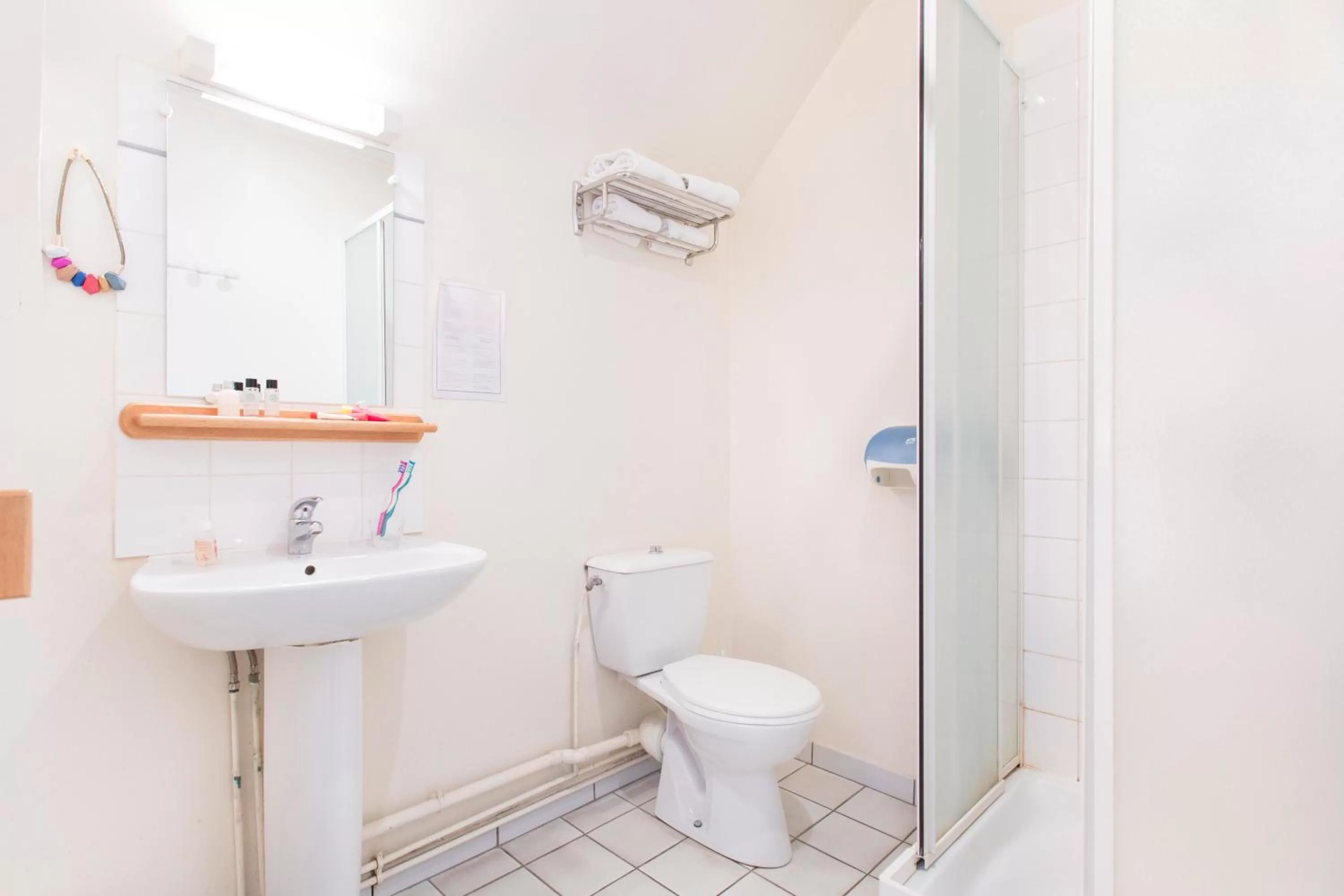 Shower in Hôtel Les Gens De Mer Lorient by Popinns