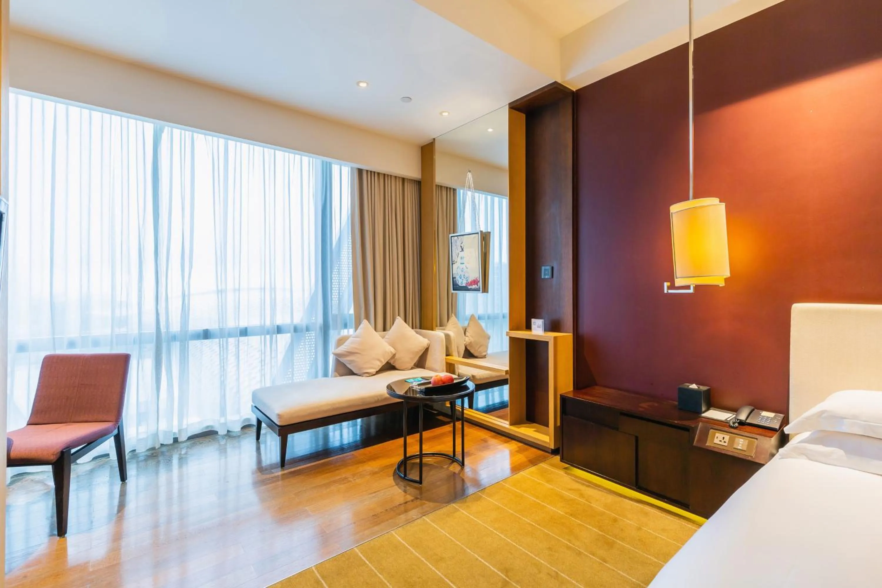 Seating area, Bed in Hotel Kapok Shenzhen Bay