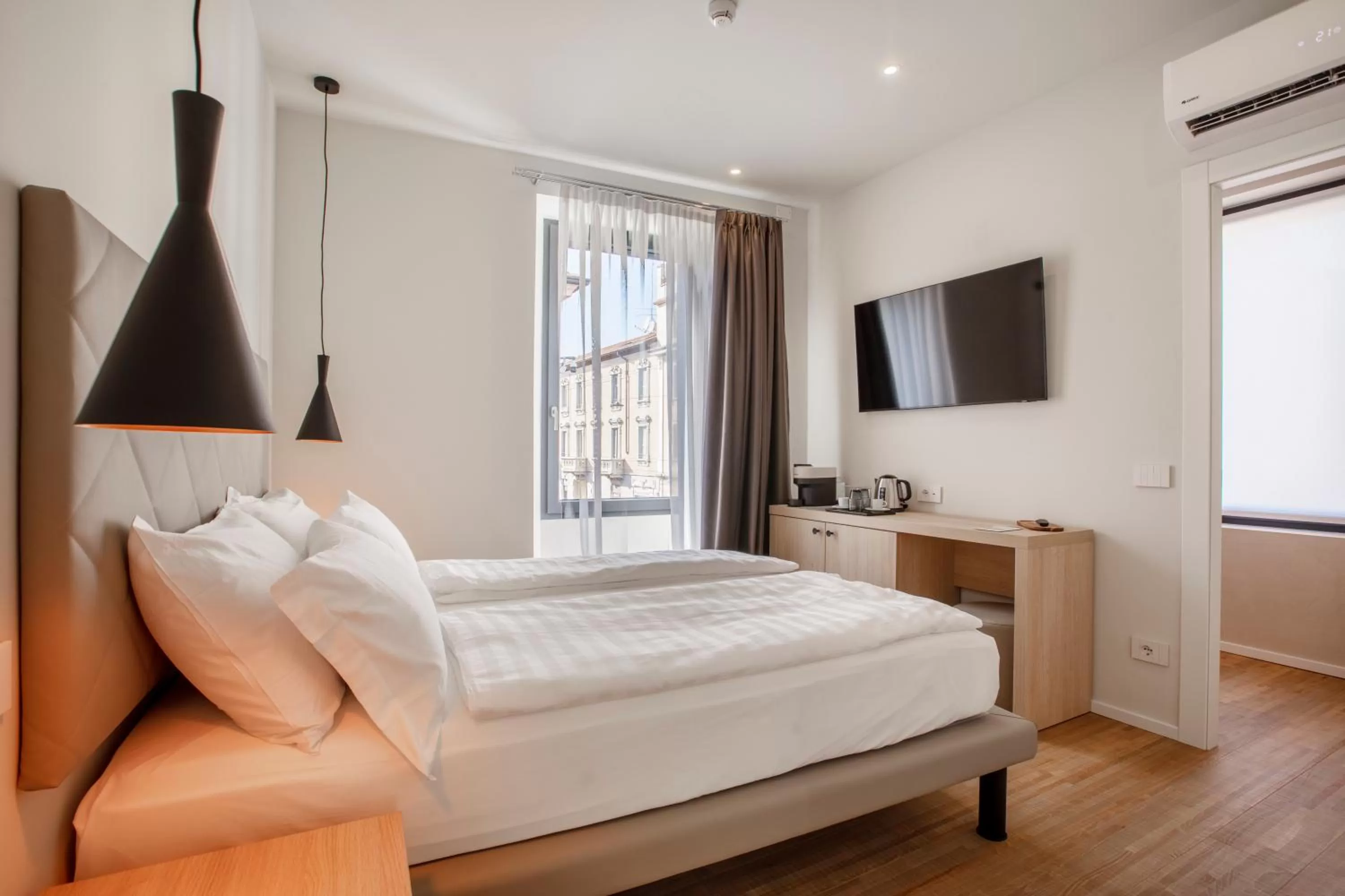 Bed in Ah Villaglori Boutique Apartments