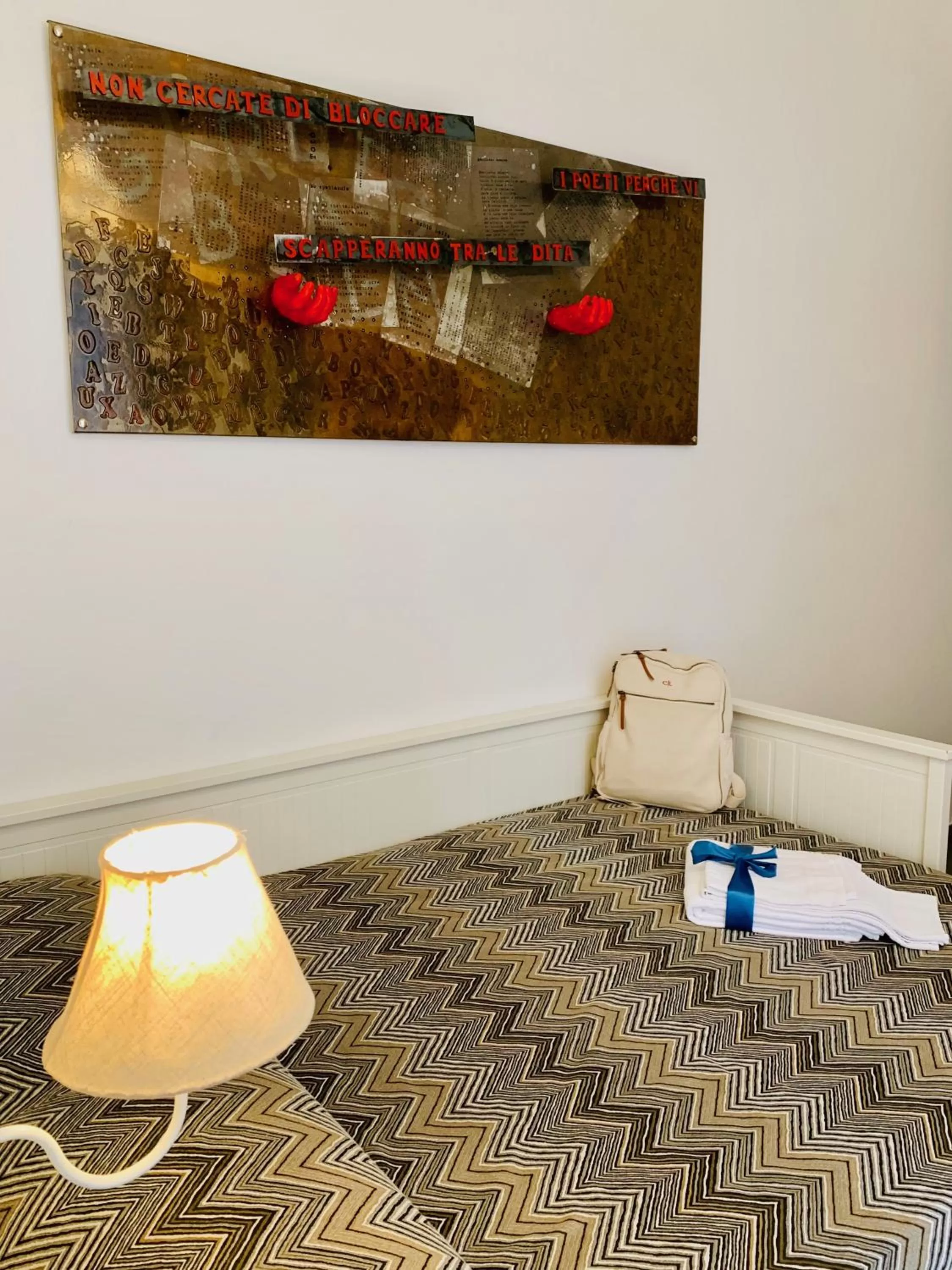 Decorative detail, Bed in Relais Piazza Del Plebiscito B&B